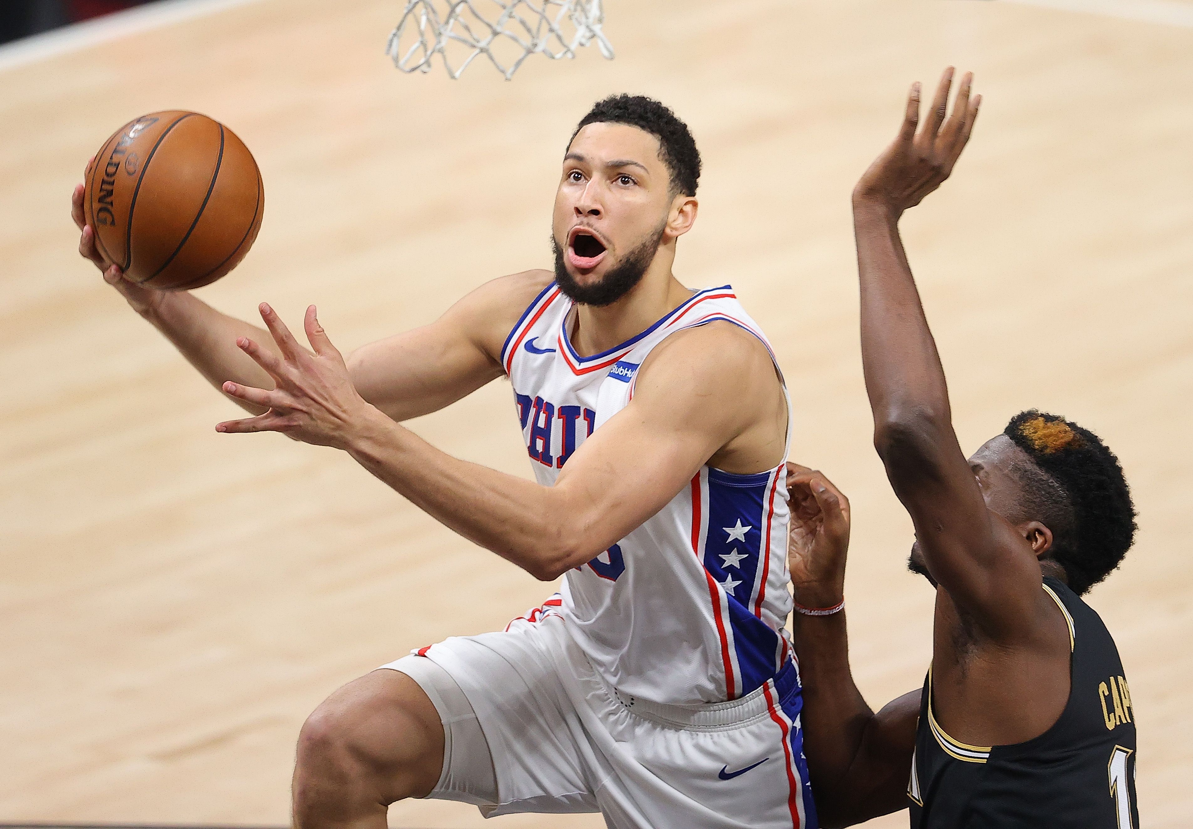 Ben Simmons lays up the ball