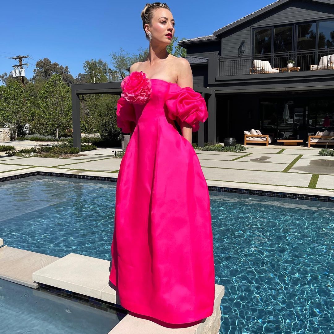 Kaley Cuoco poolside in a dress