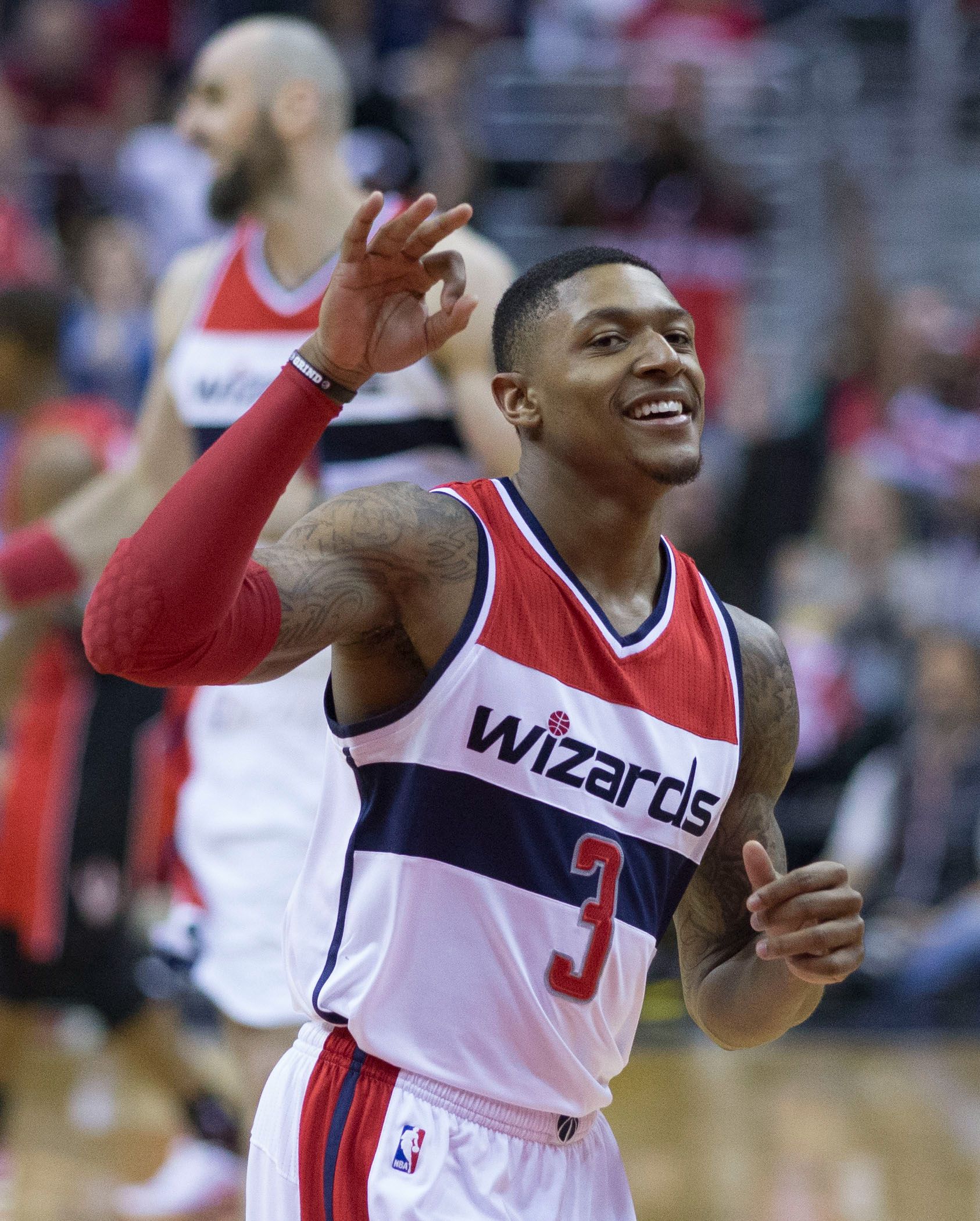Bradley Beal showing a three-point sign