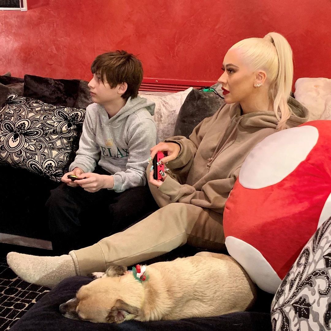 Christina Aguilera gaming with her son