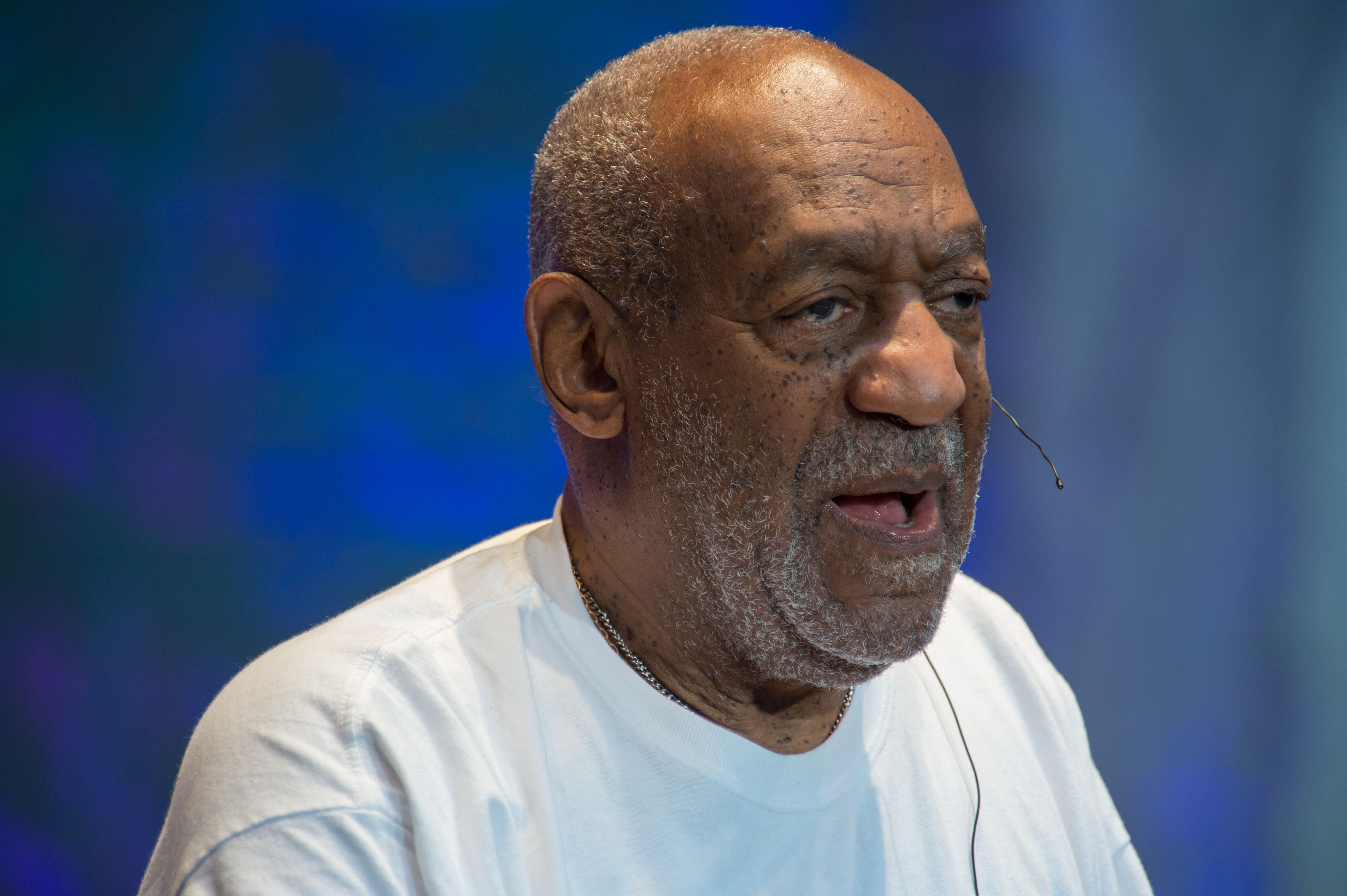 Comedian Bill Cosby speaks at an event.