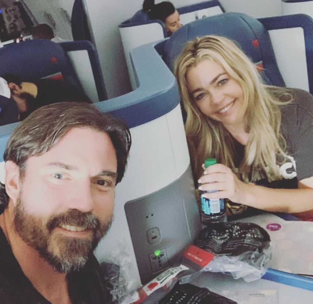 Aaron Phypers and Denise Richards take a first-class flight.