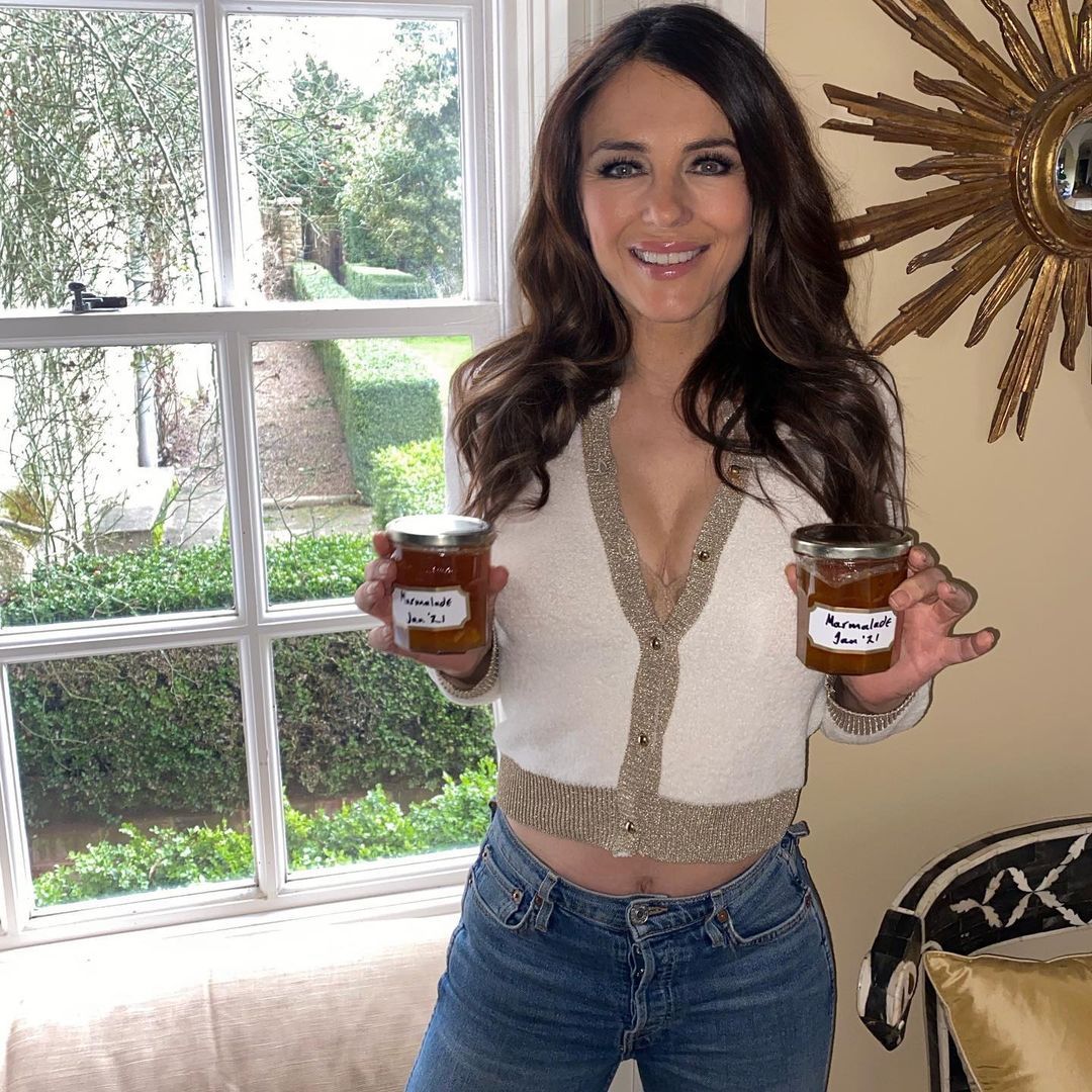 Elizabeth Hurley in jeans with marmalade