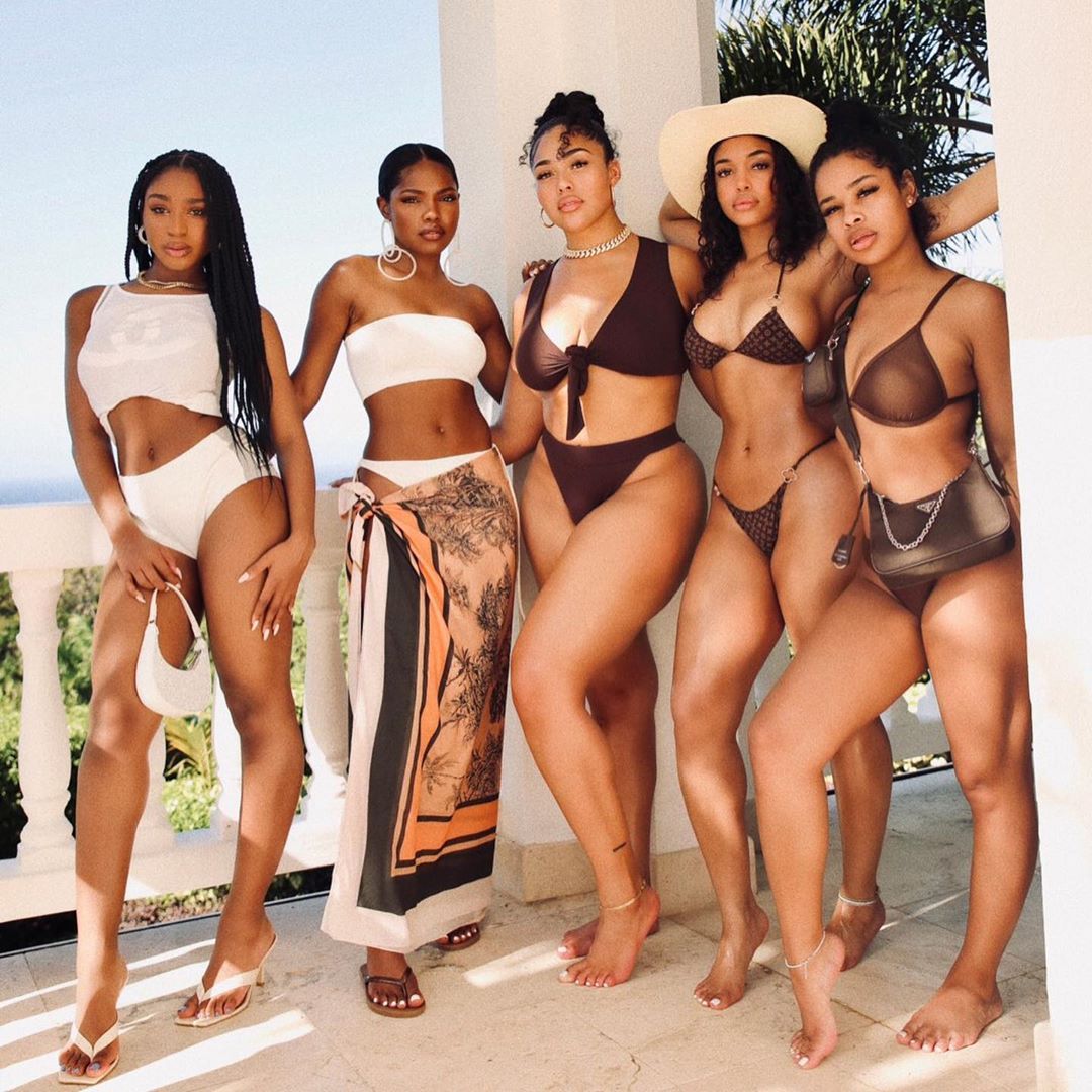 Jordyn Woods poses with friends in bikinis