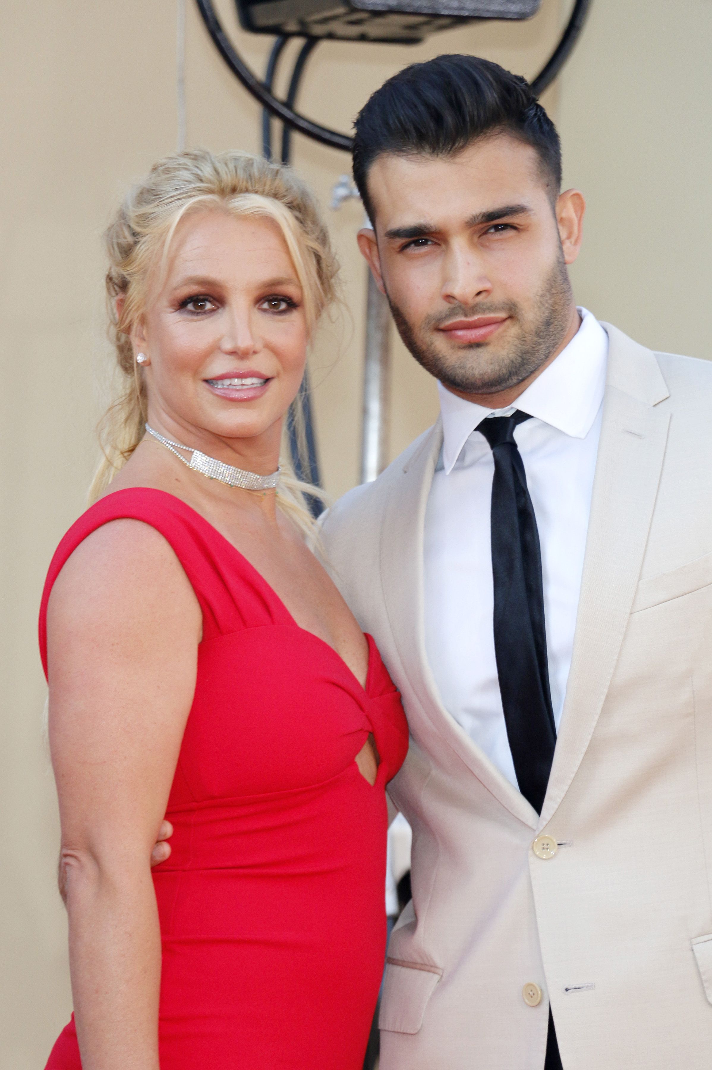Britney Spears and Sam Asghari at an event