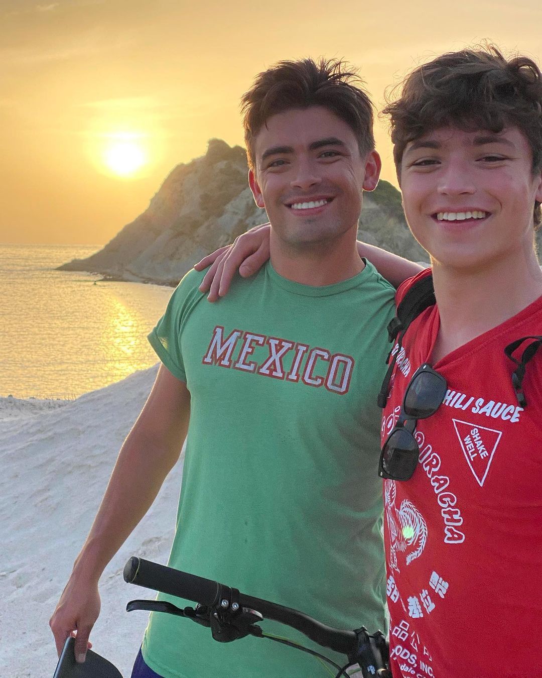 Kelly Ripa's sons, Michael and Joaquin, pose for a selfie at the beach.