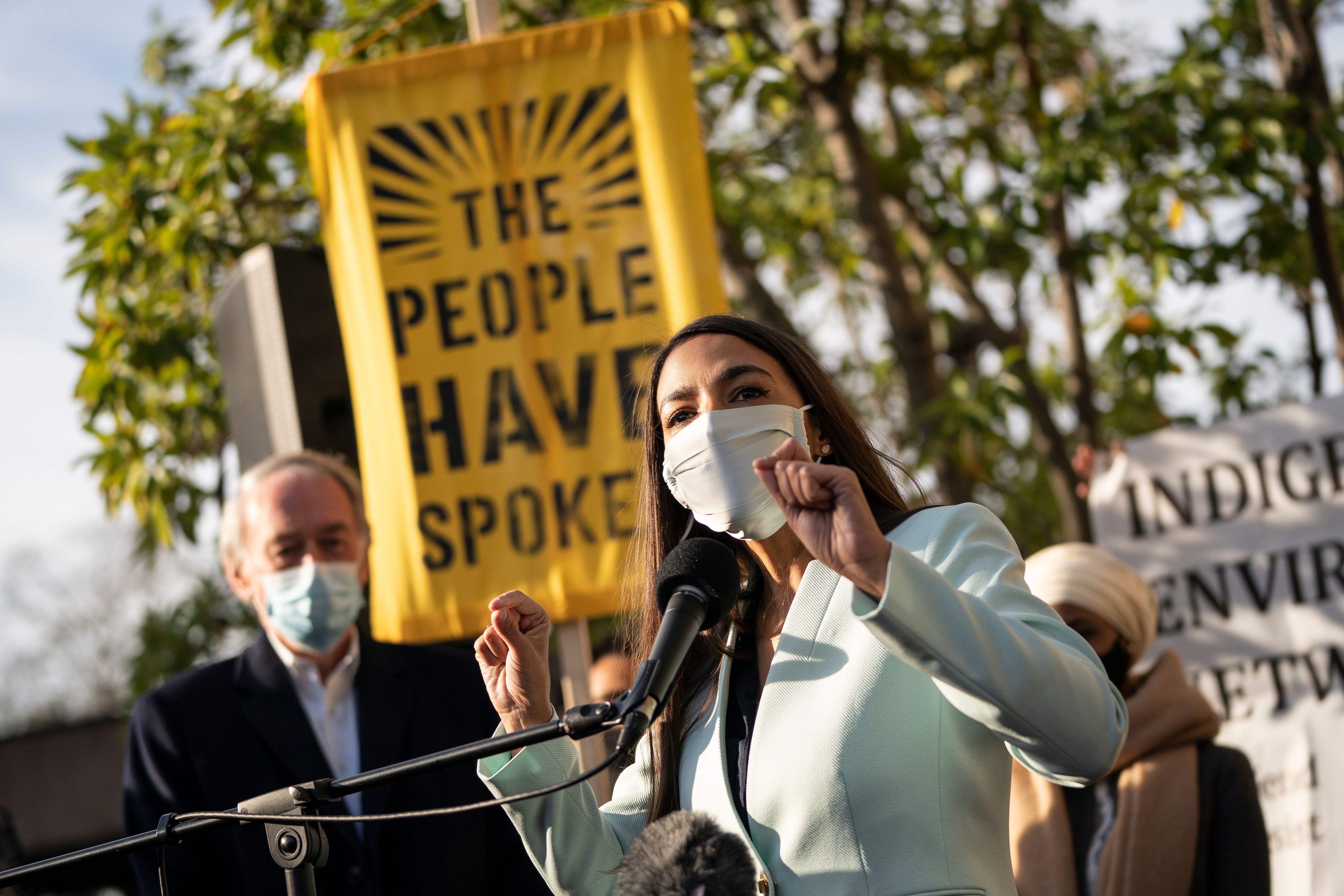 Alexandria Ocasio-Cortez speaks at a rally.