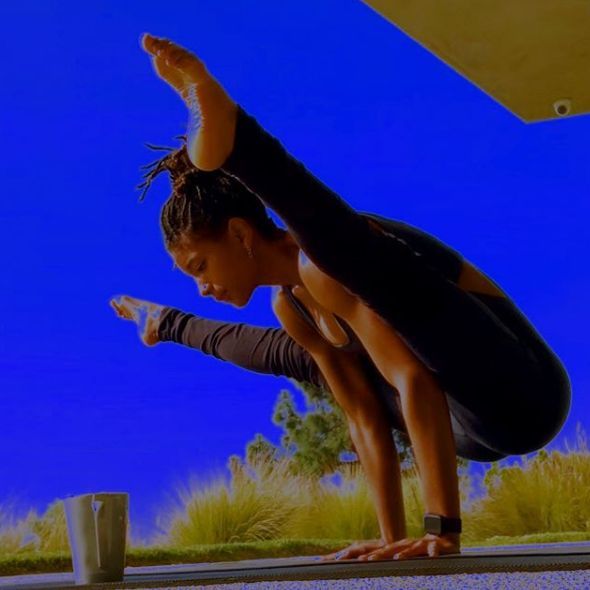 Willow Smith poses in a yoga move outdoors