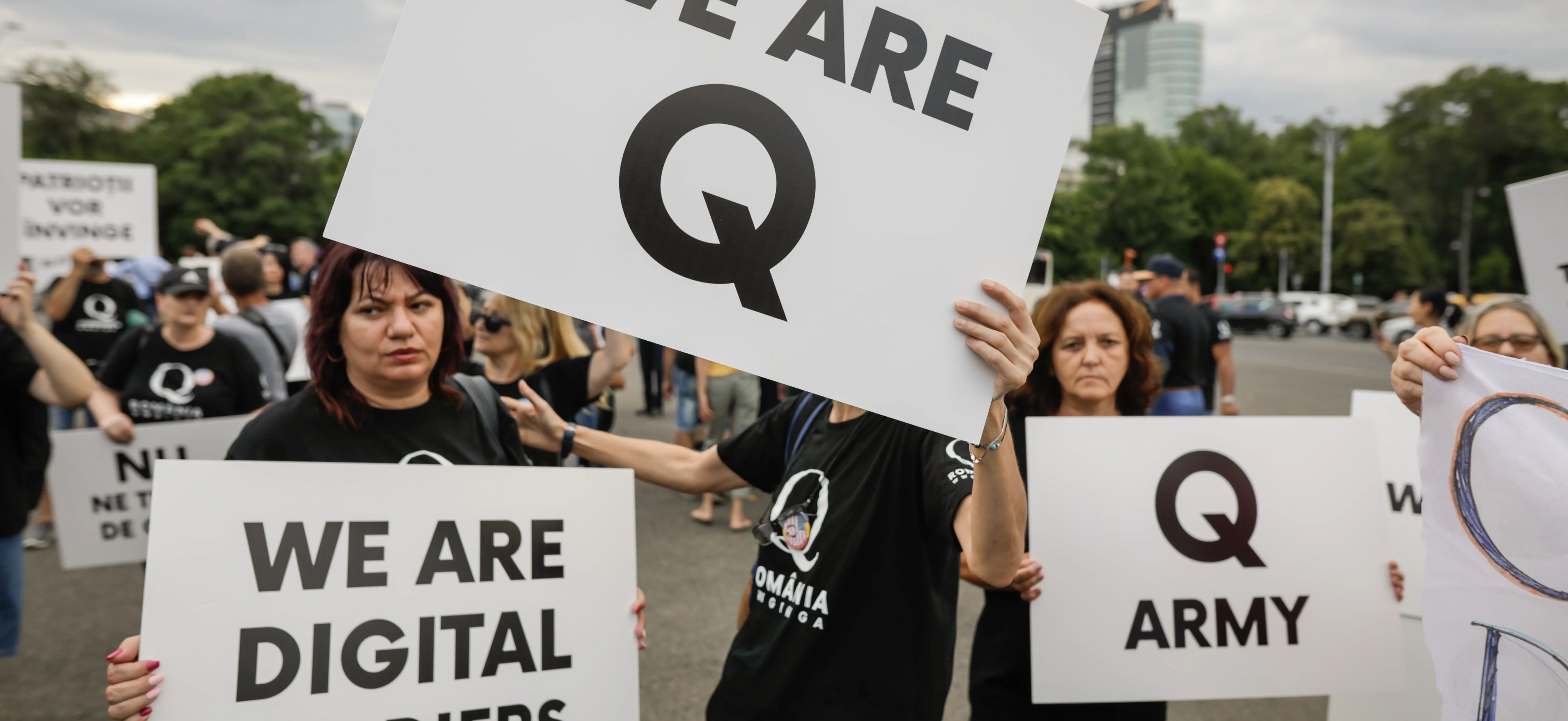 QAnon supporters hold a protest.