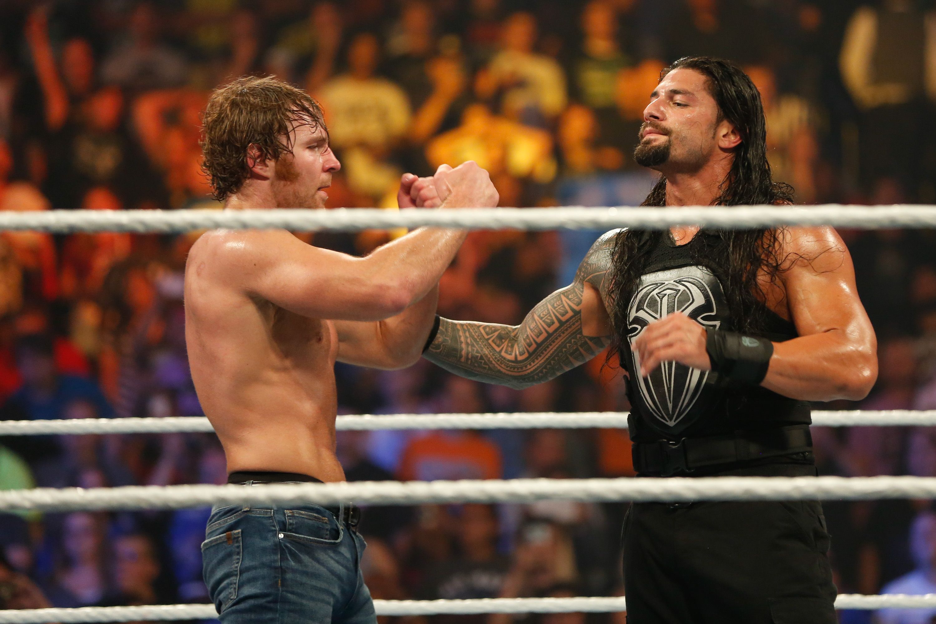 Roman Reigns attacking his opponent