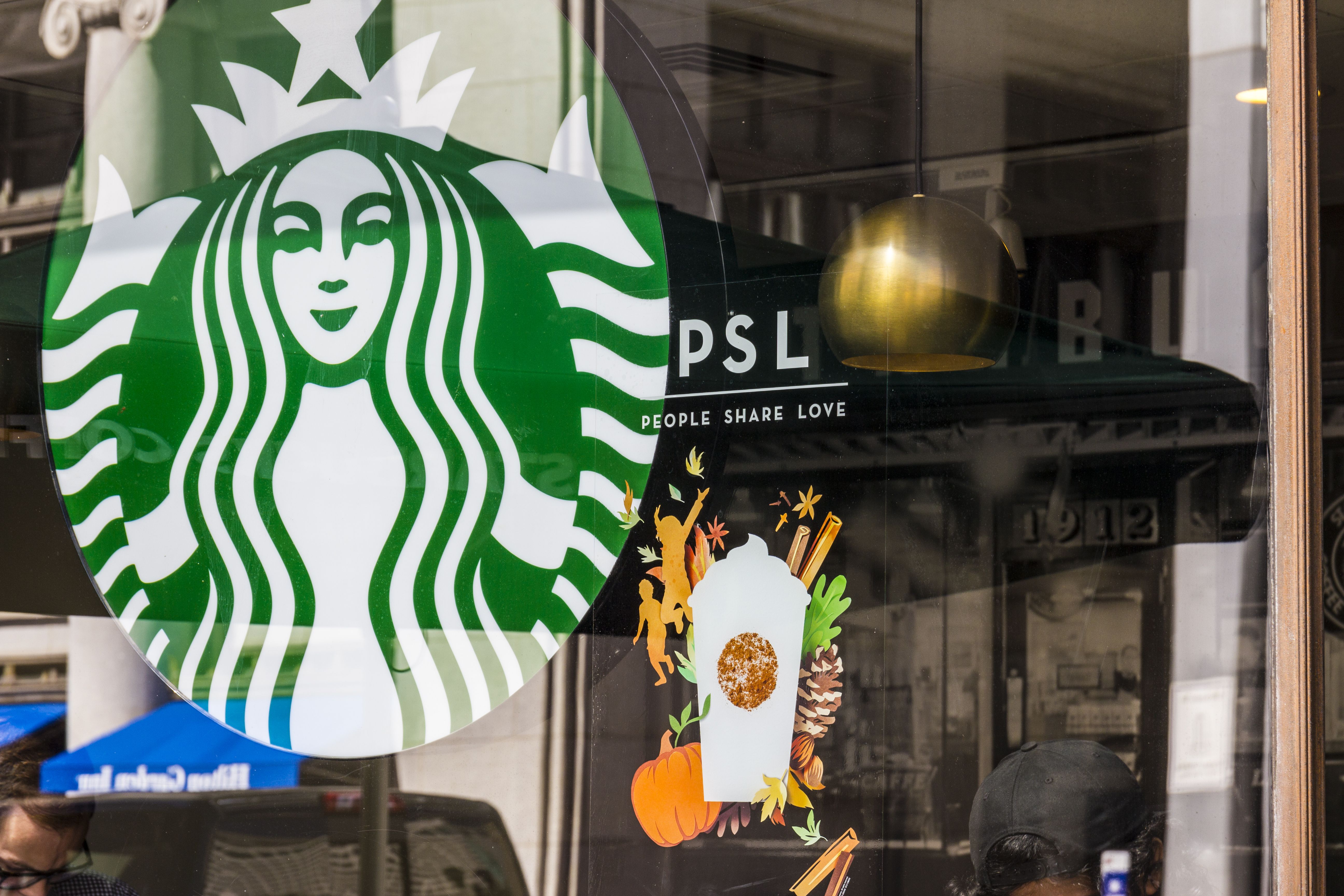 PSL sign on Starbucks coffeeshop window. 