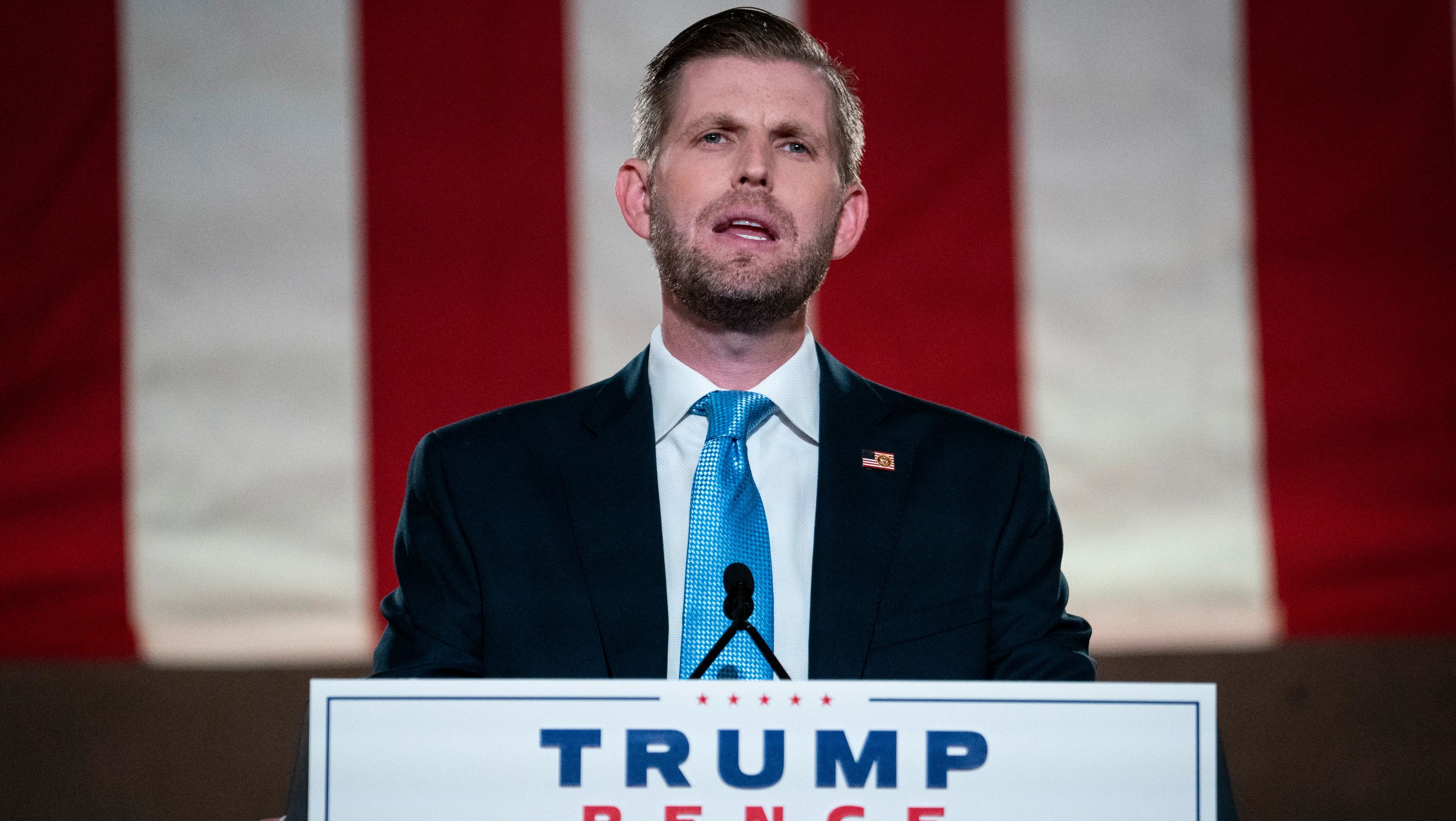 Eric Trump speaks at an event.
