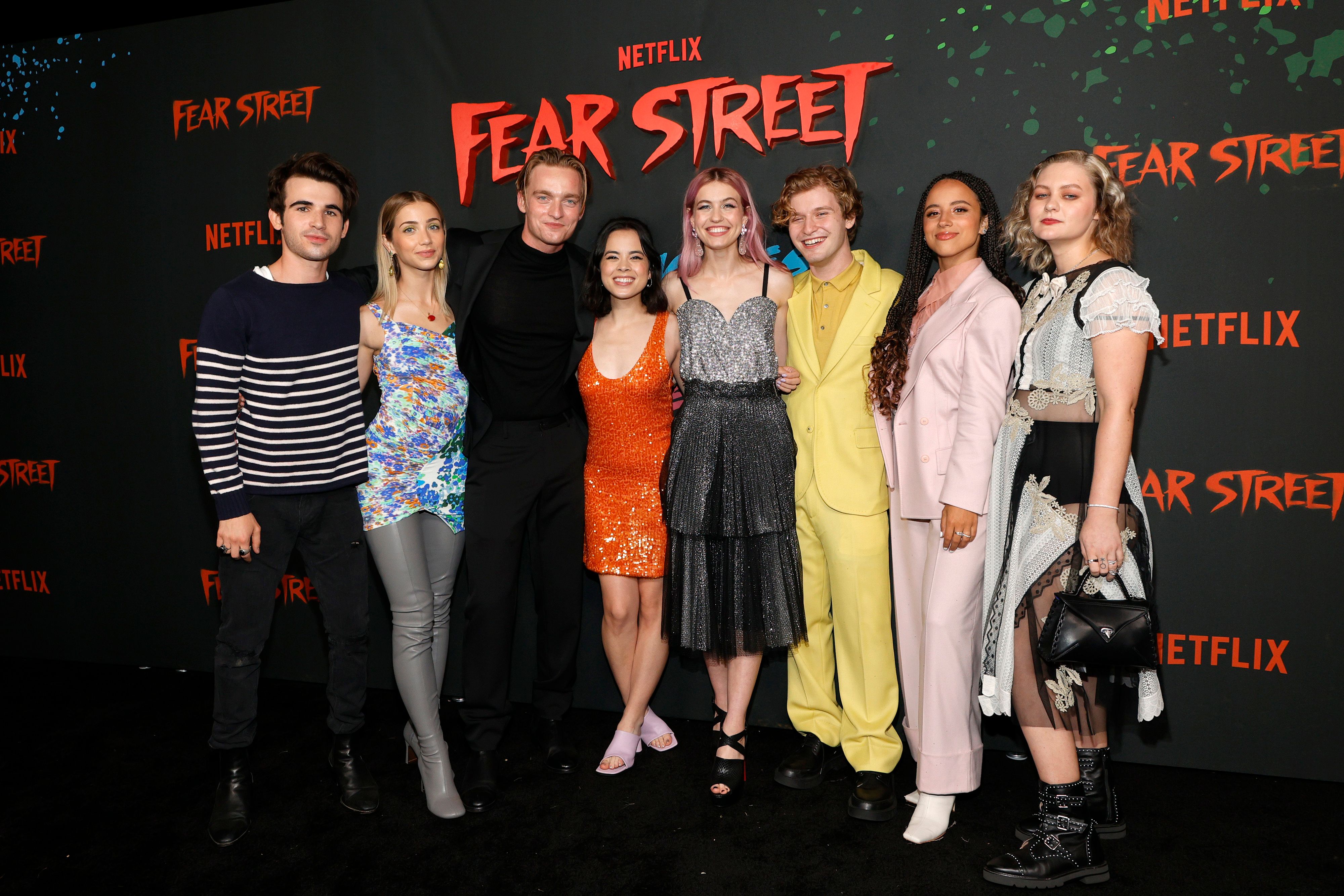 The 'Fear Street' cast wraps their arms around each other.