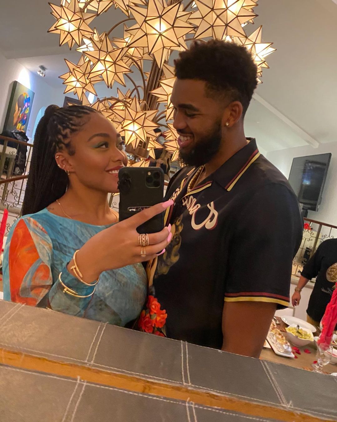 Jordyn Woods and Karl Anthony-Towns gaze lovingly at each other while snapping a mirror selfie.