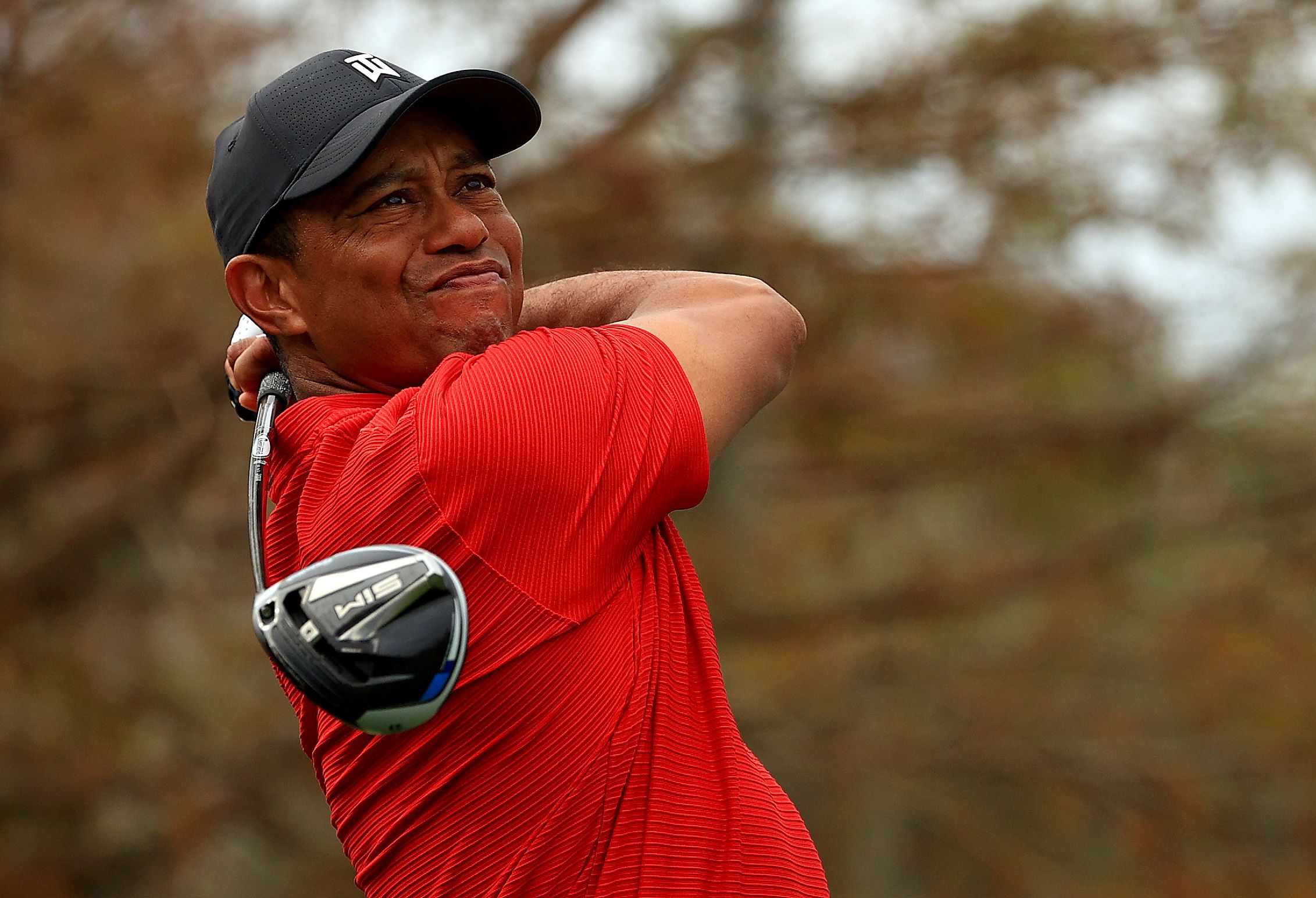 Tiger Woods takes a swing.