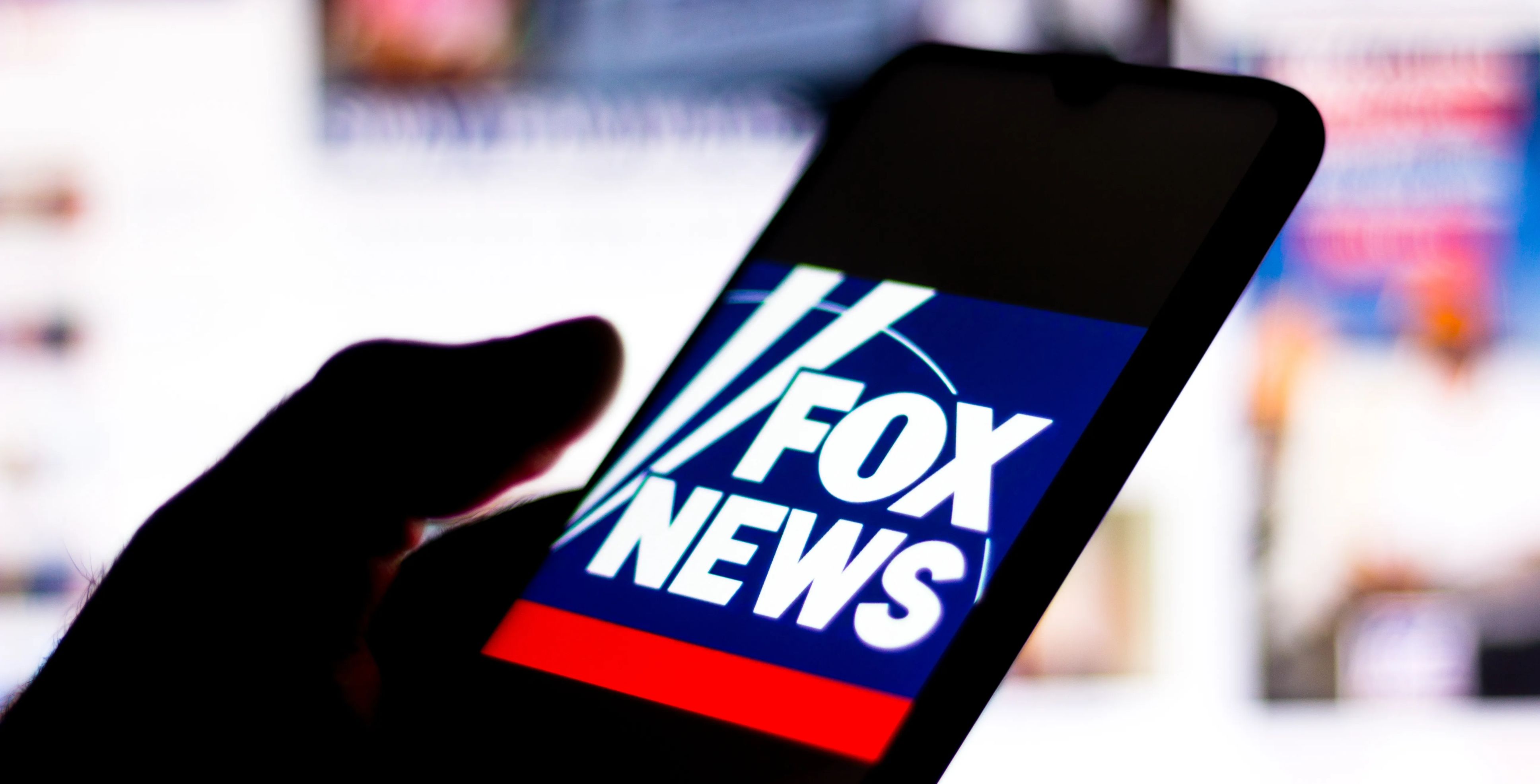 Fox News logo on a smartphone screen.