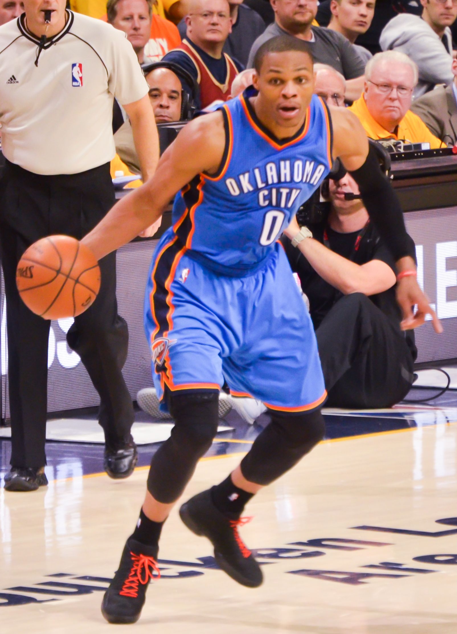 Russell Westbrook dribbling the basketball.