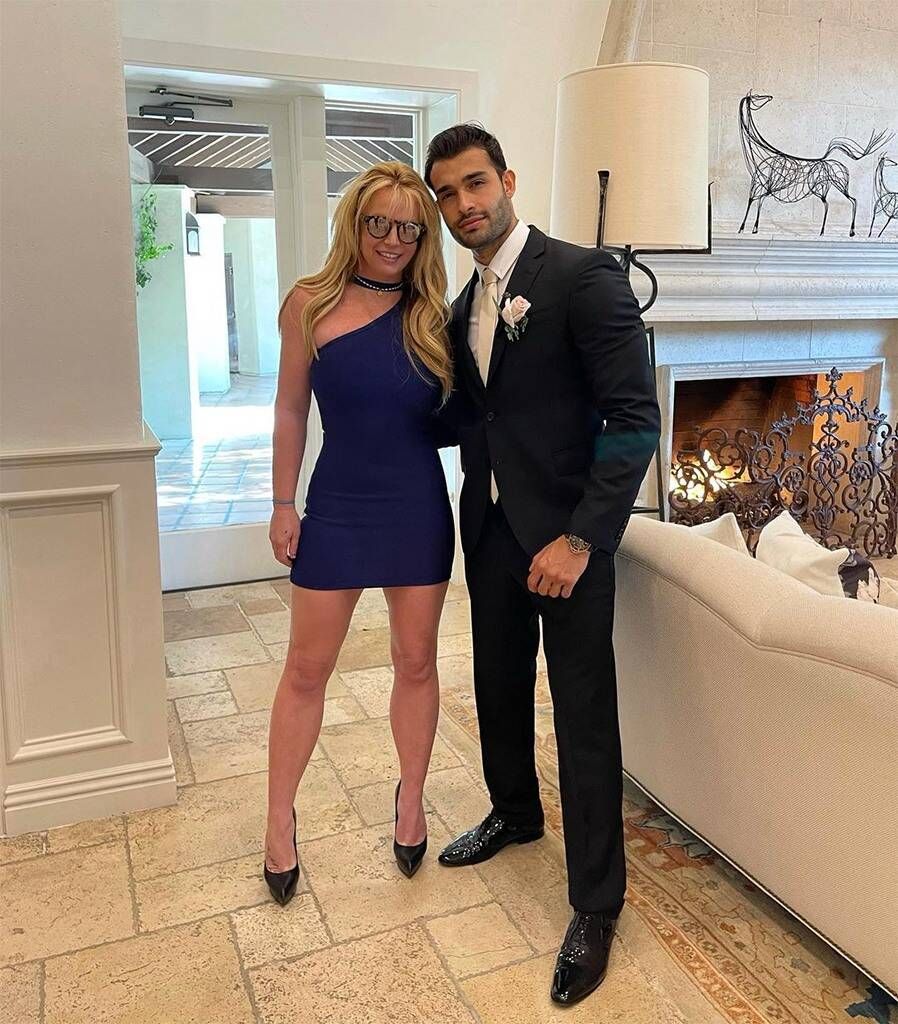 Britney Spears and Sam Asghari indoors