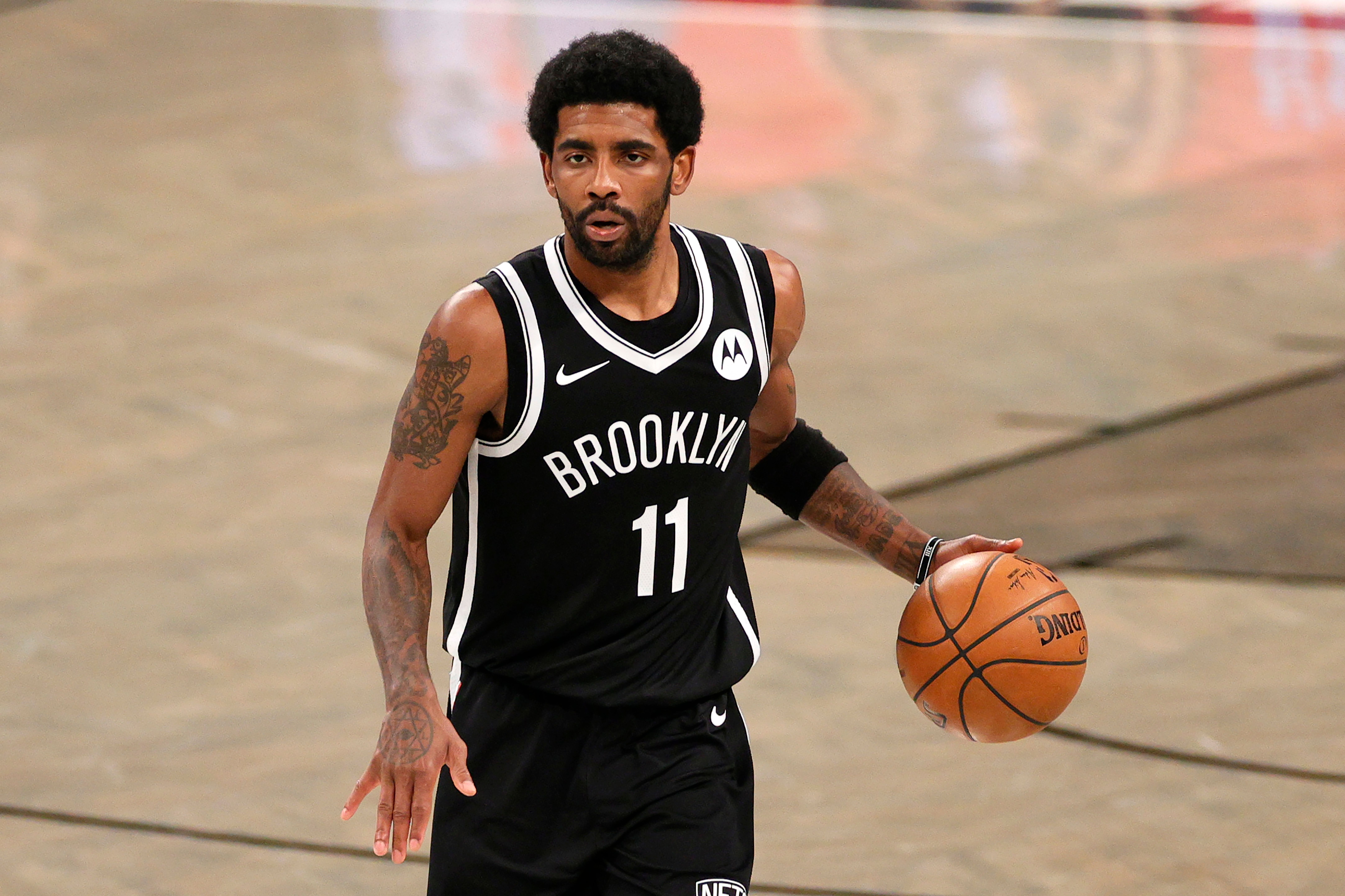 Kyrie Irving running the Nets' offense