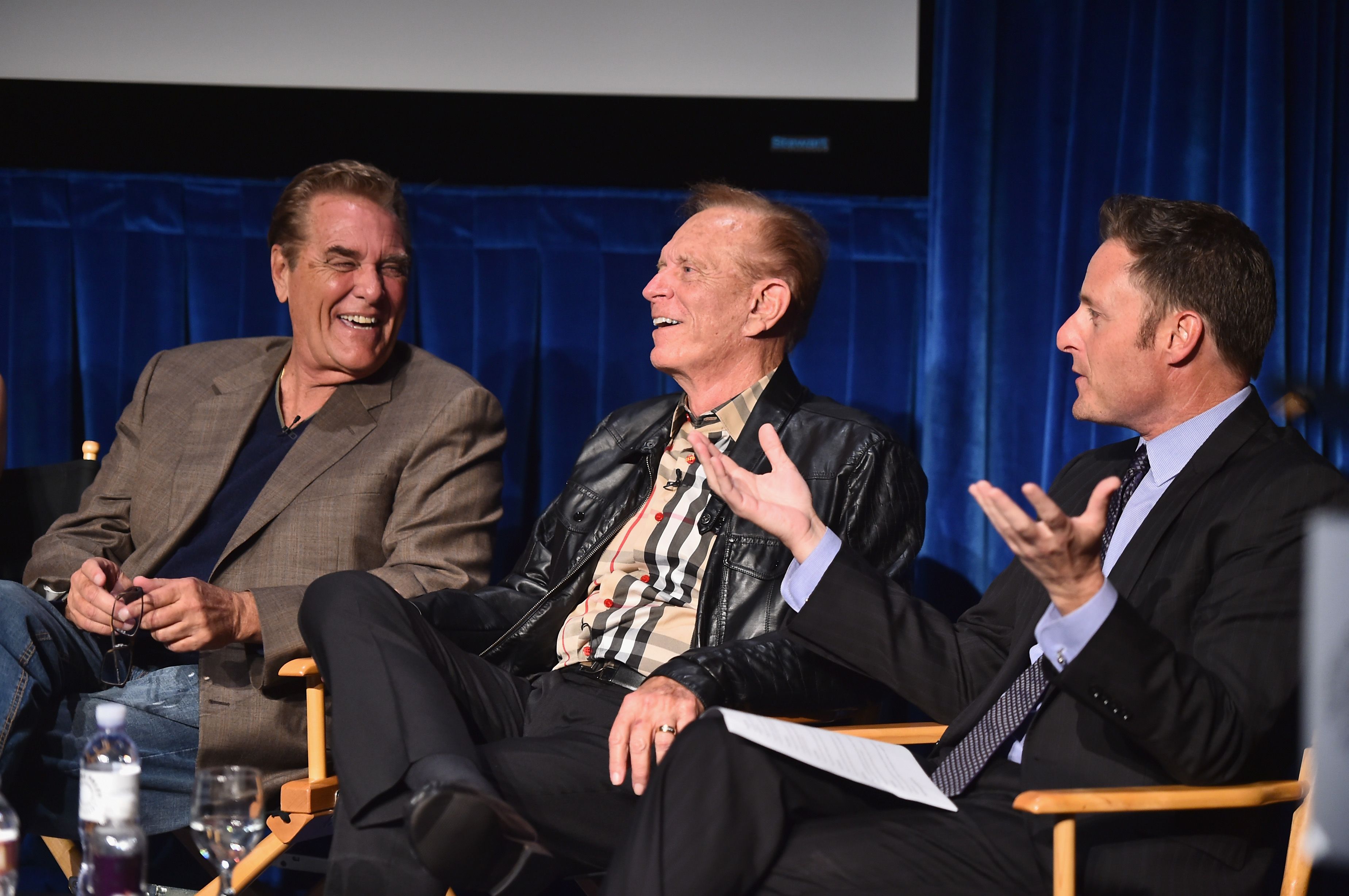 Chuck Woolery, Bob Eubanks, and Chris Harrison sit in director's chairs.