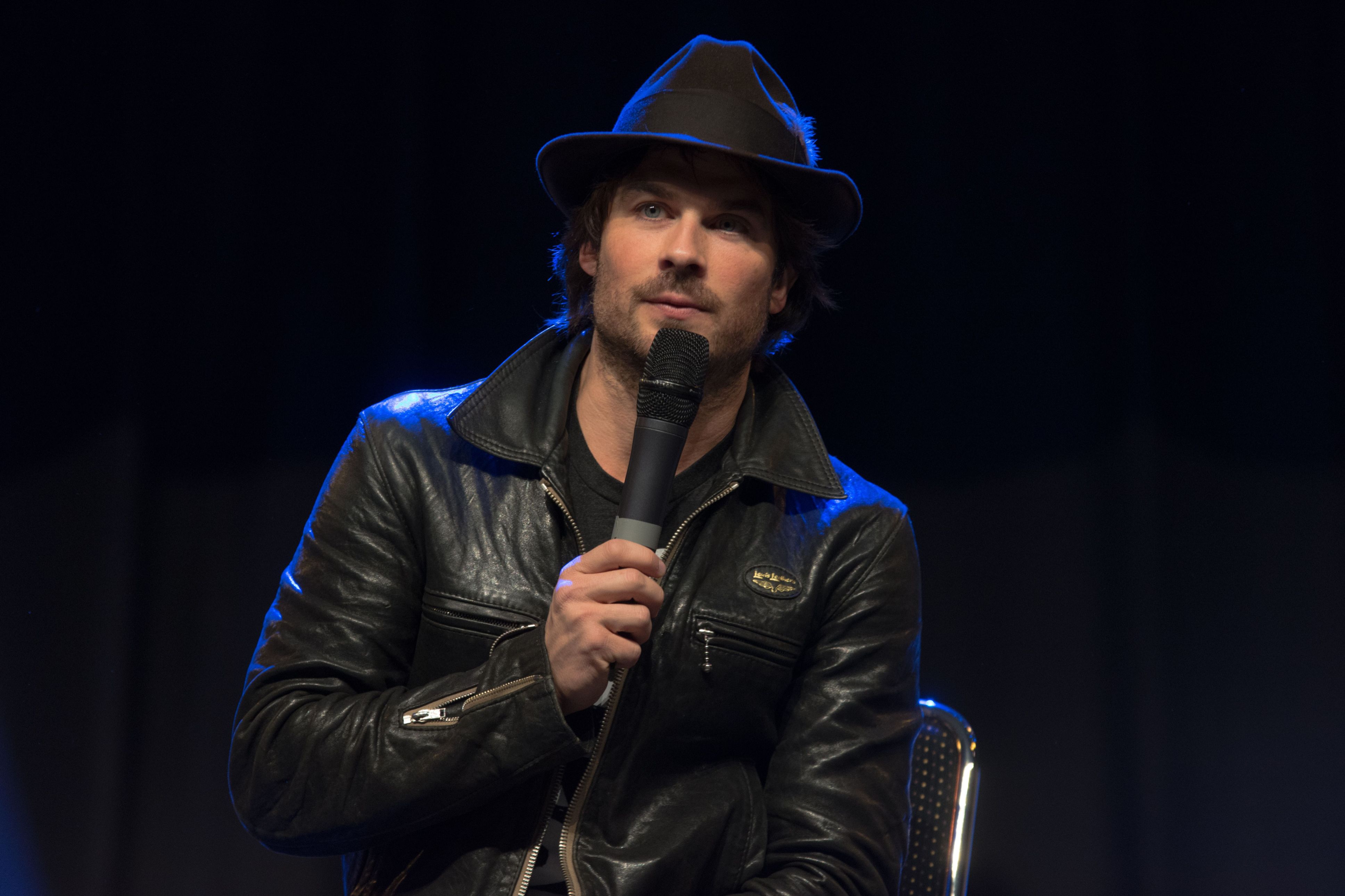 Ian Somerhalder in a leather jacket and hat.