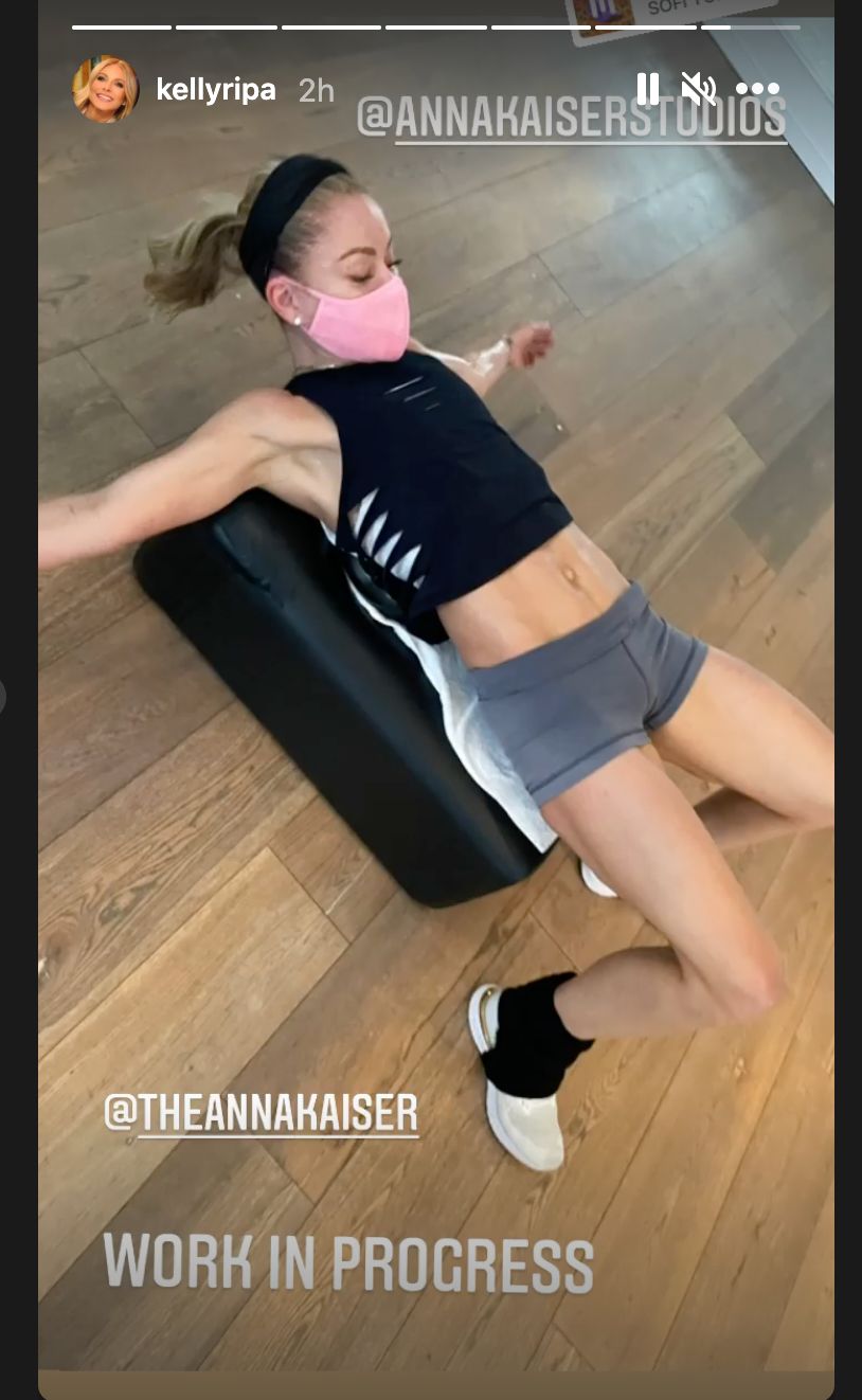 Kelly Ripa working out indoors