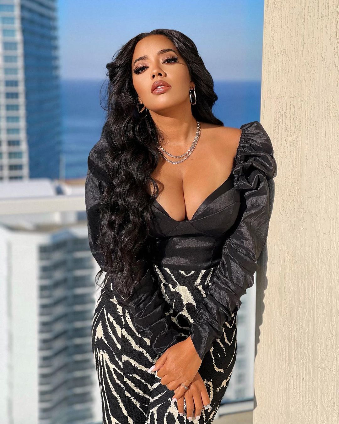 Angela Simmons in plunging dress