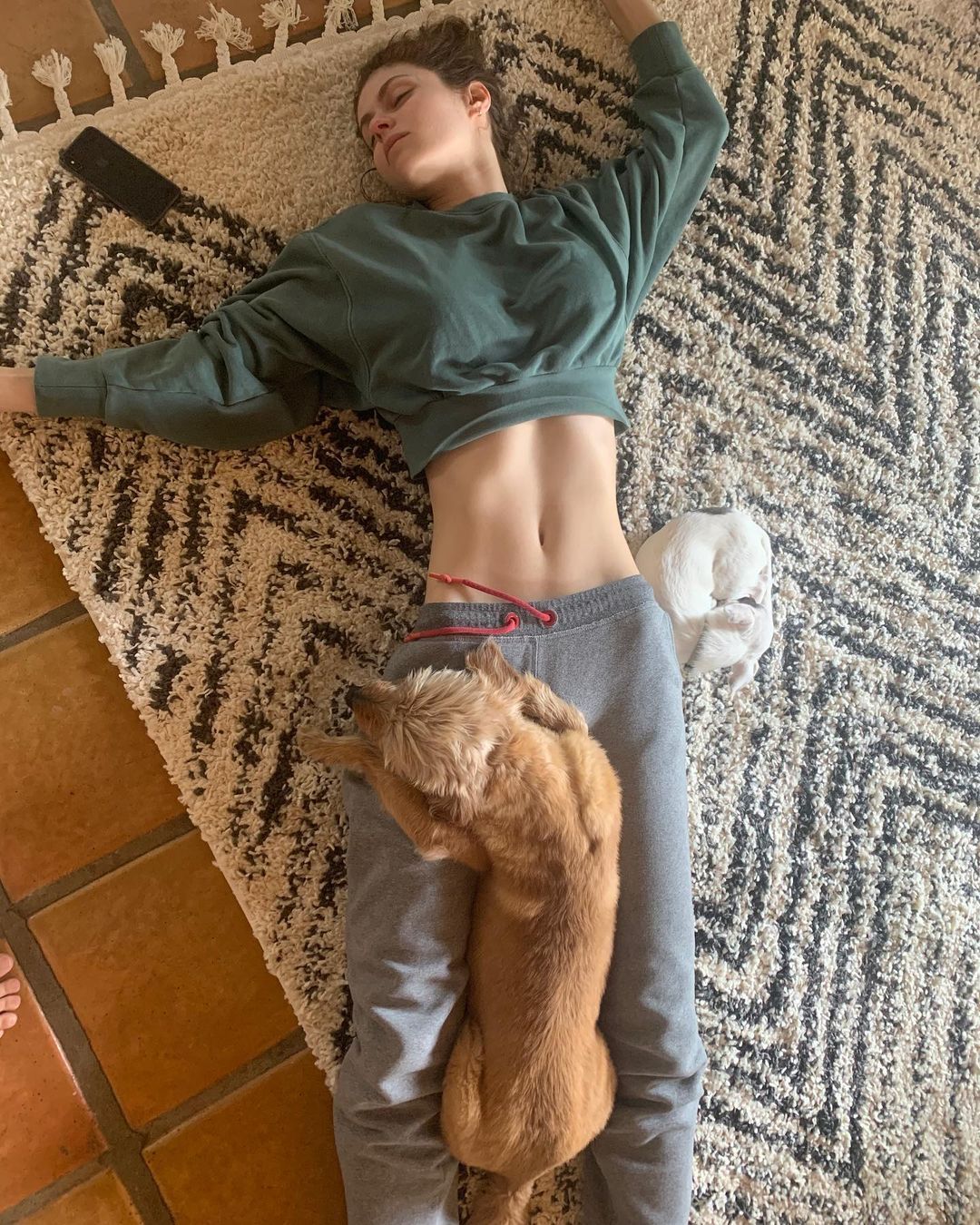 Alexandra Daddario napping in sweats