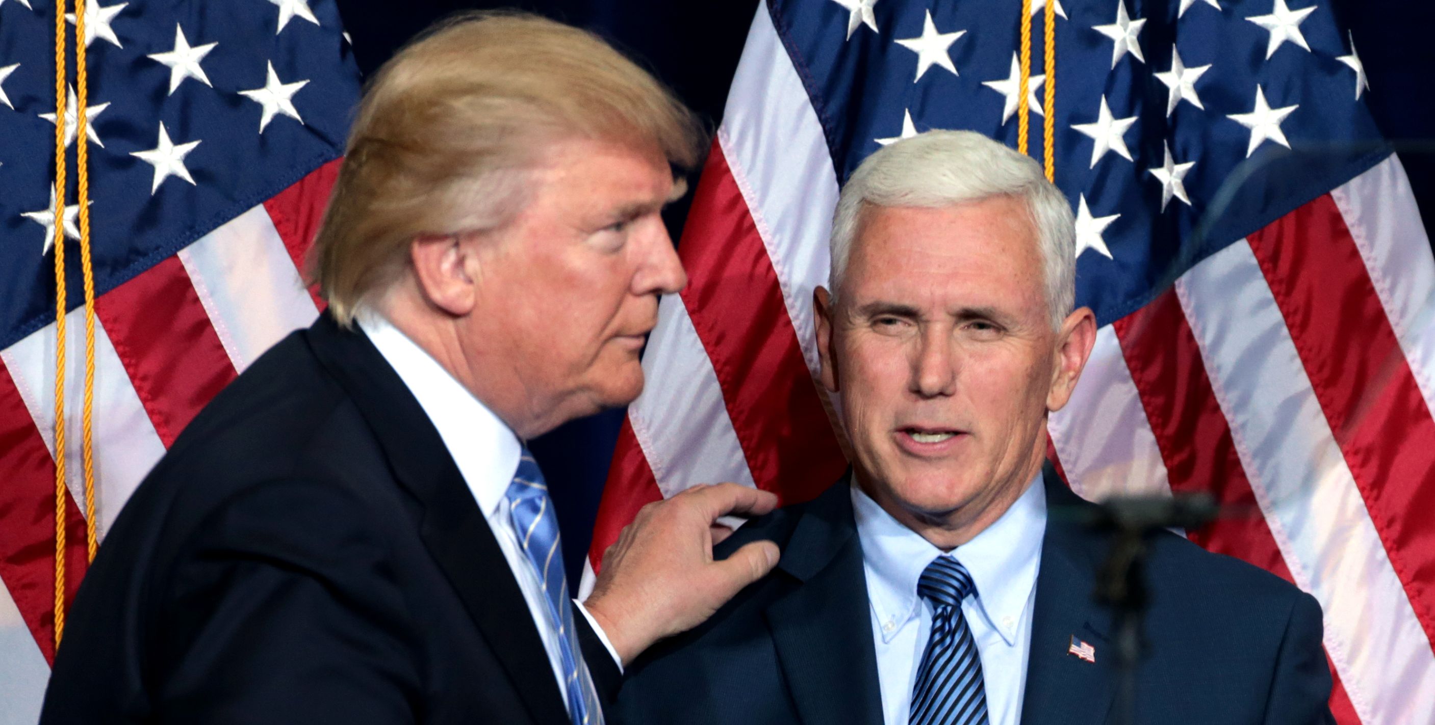Former President Donald Trump, former Vice President Mike Pence stand together.