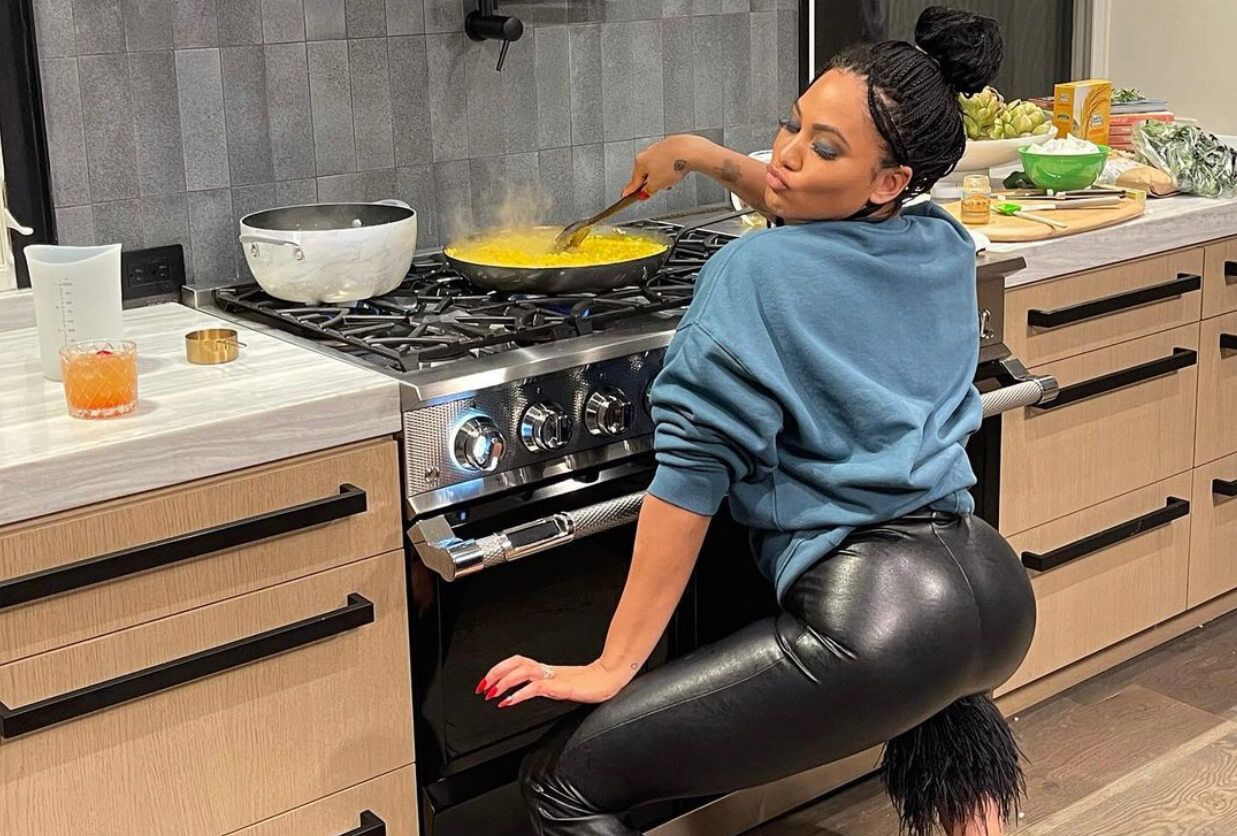 Ayesha Curry cooking in pants