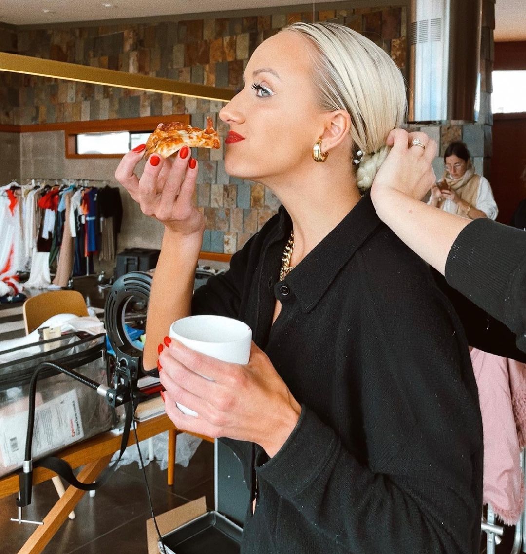 Nastia Liukin with pizza in a shirt