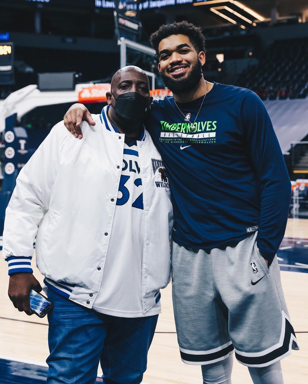 Karl-Anthony Towns on court with his dad.