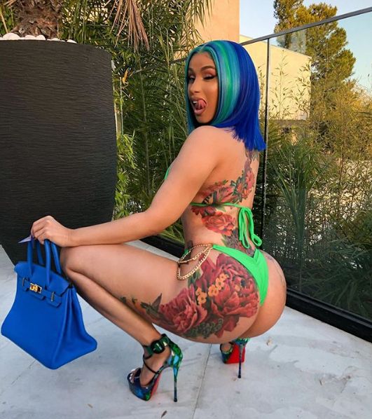 Cardi B shows tattoos in a bikini and heels
