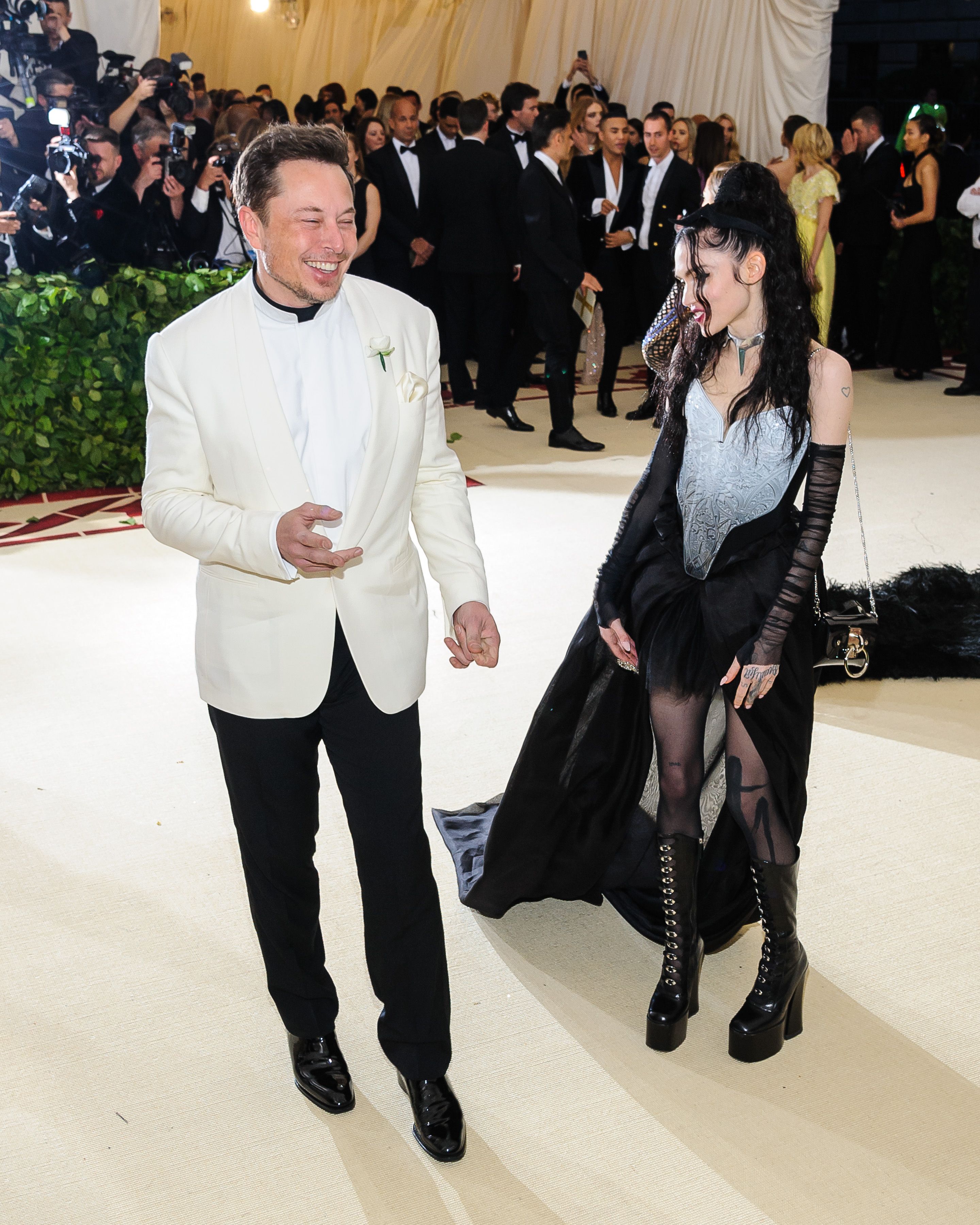 Elon Musk and Grimes at an event. 