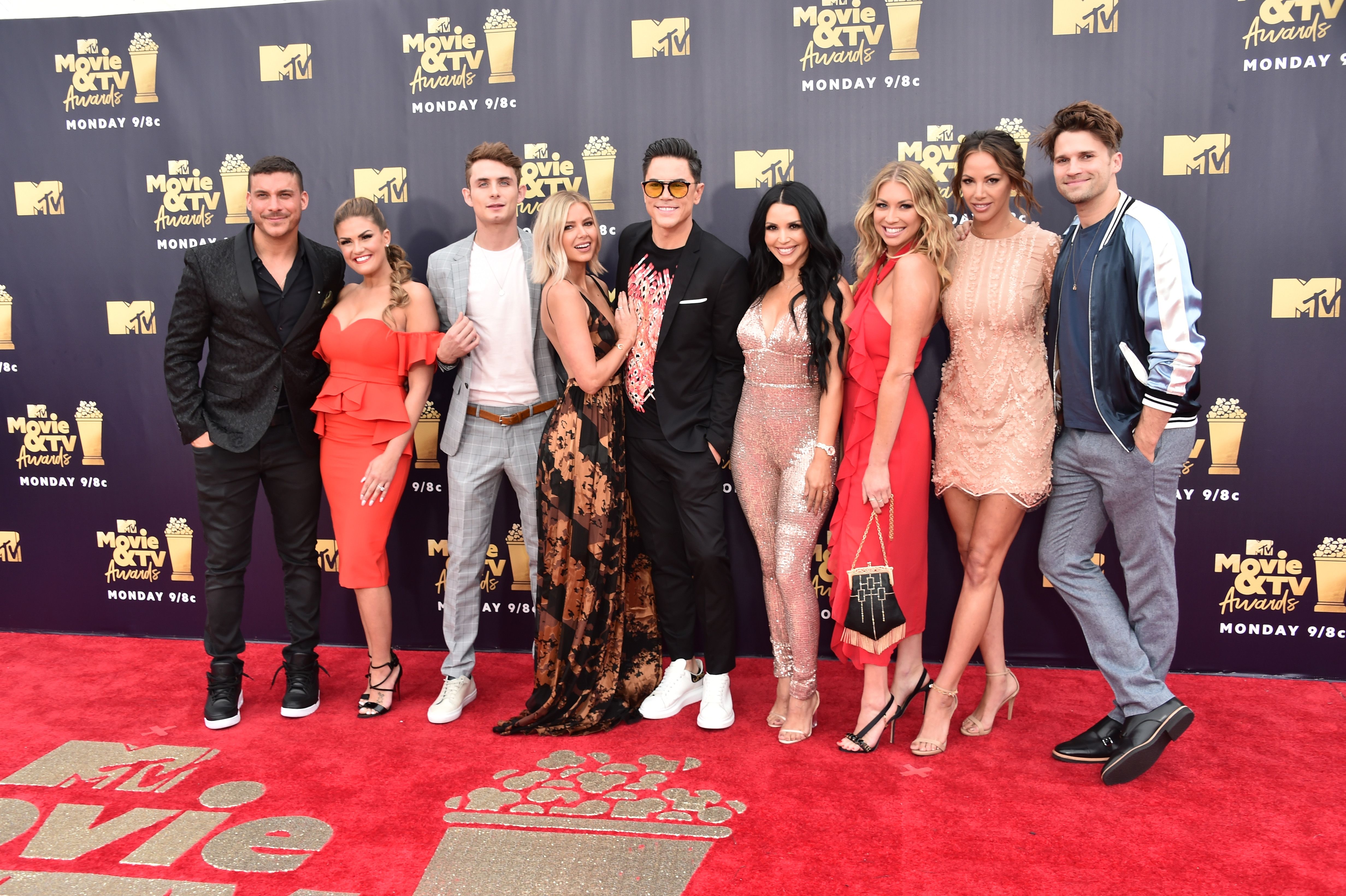 The 'Vanderpump Rules' cast wears dresses and suits on the red carpet.