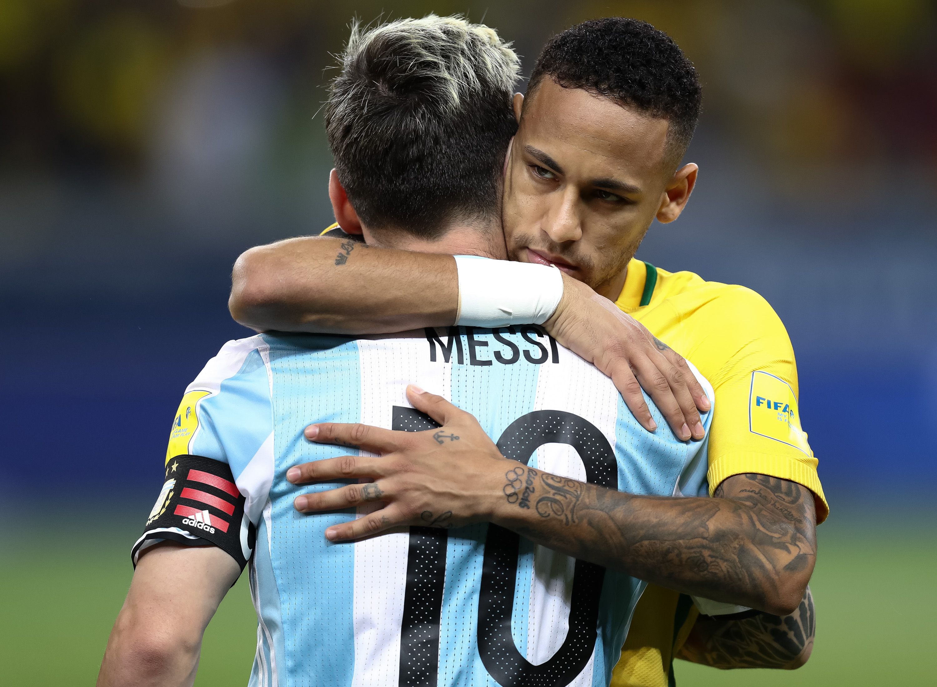 Neymar Jr hugs Lionel Messi after the game