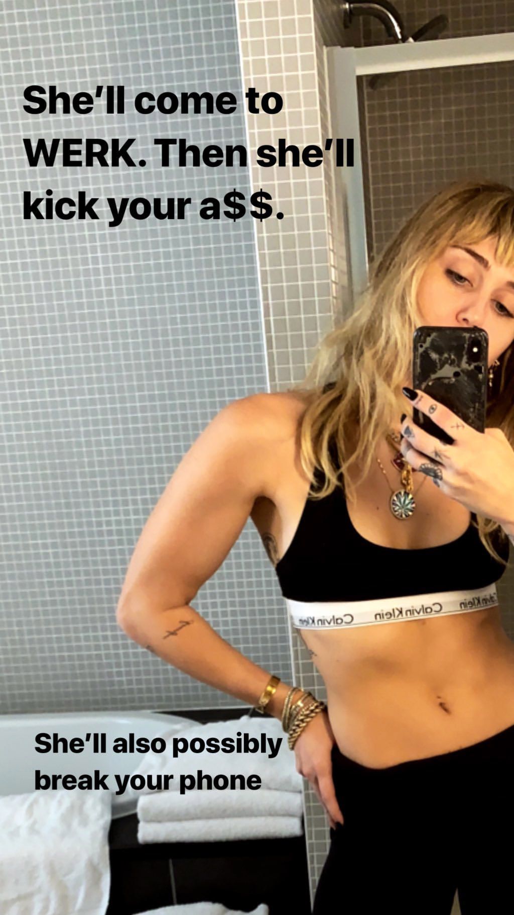 Miley Cyrus sports bra selfie