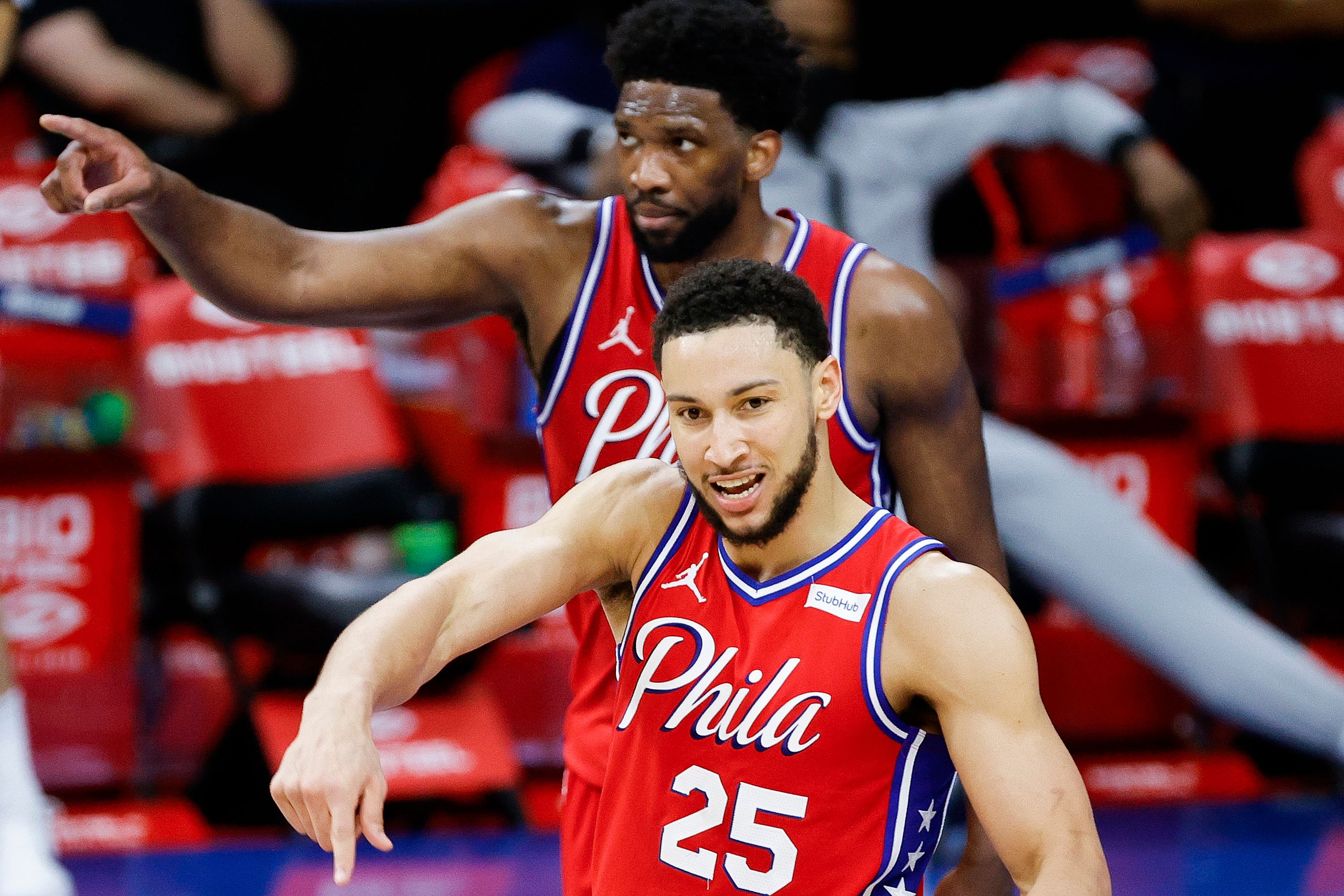Ben Simmons and Joel Embiid celebrating after Sixers' victoryh
