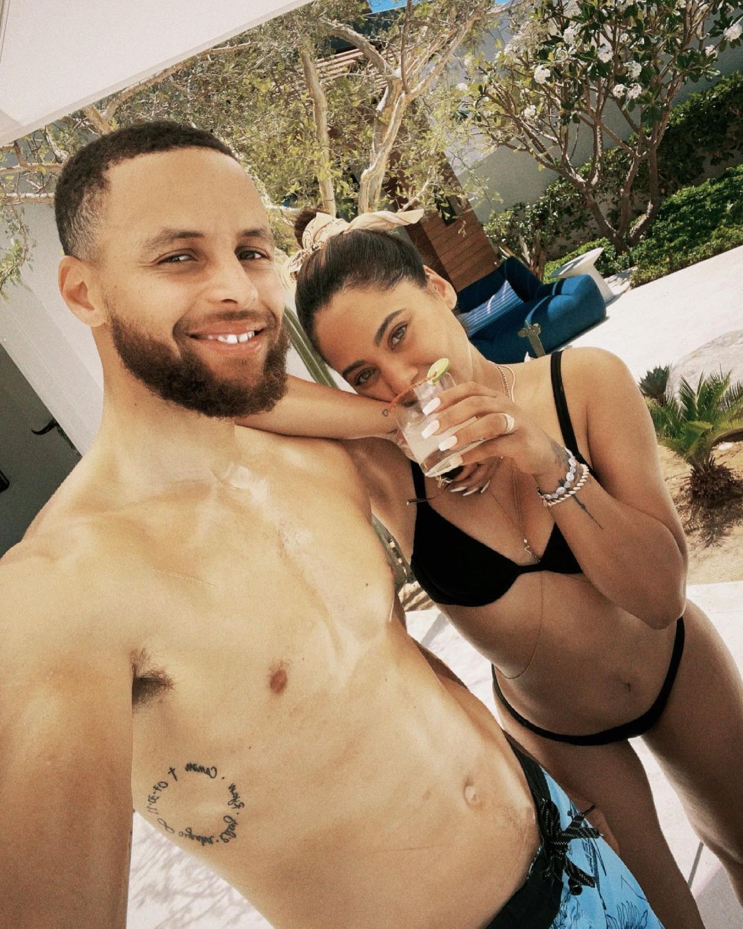 Steph and Ayesha Curry poolside