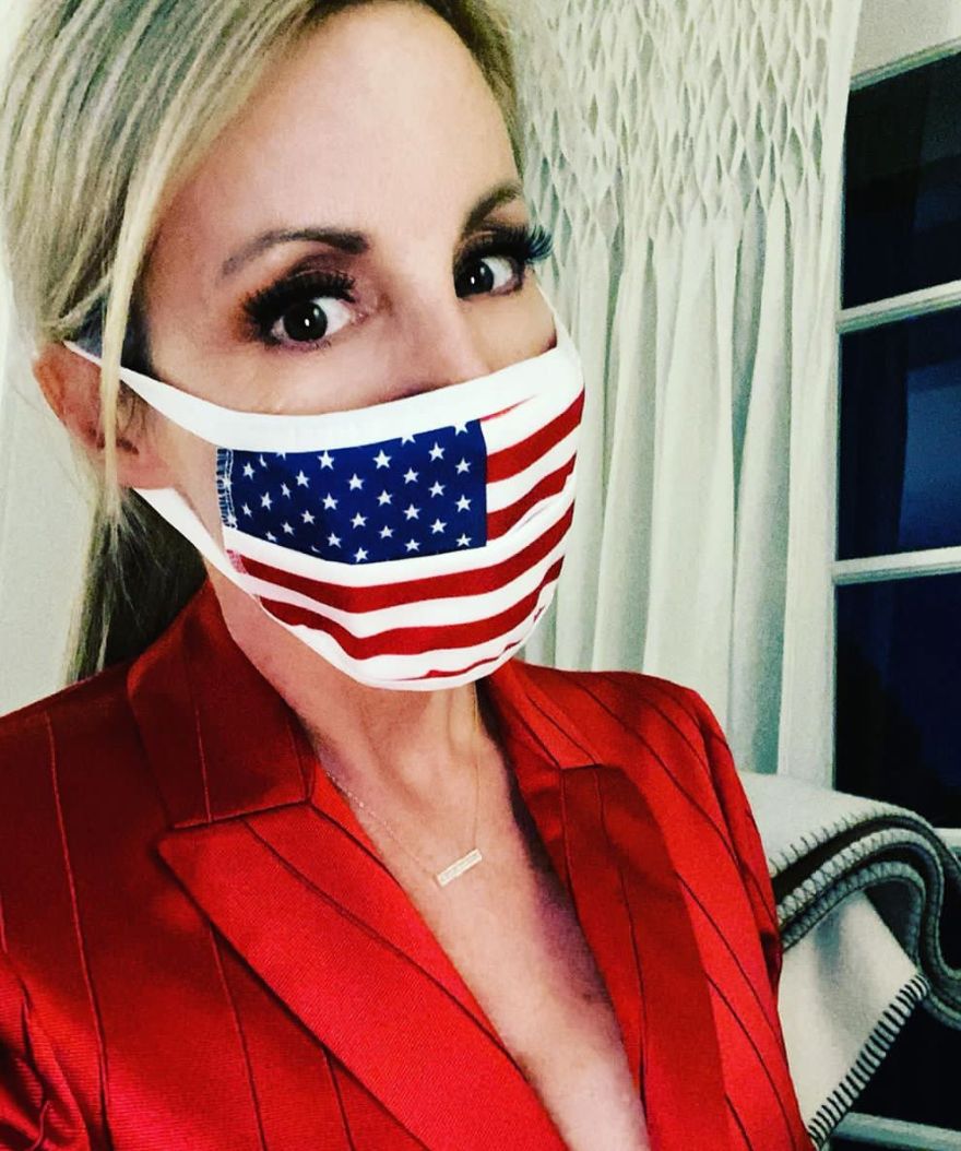 Caille Grammer wears an American flag mask.