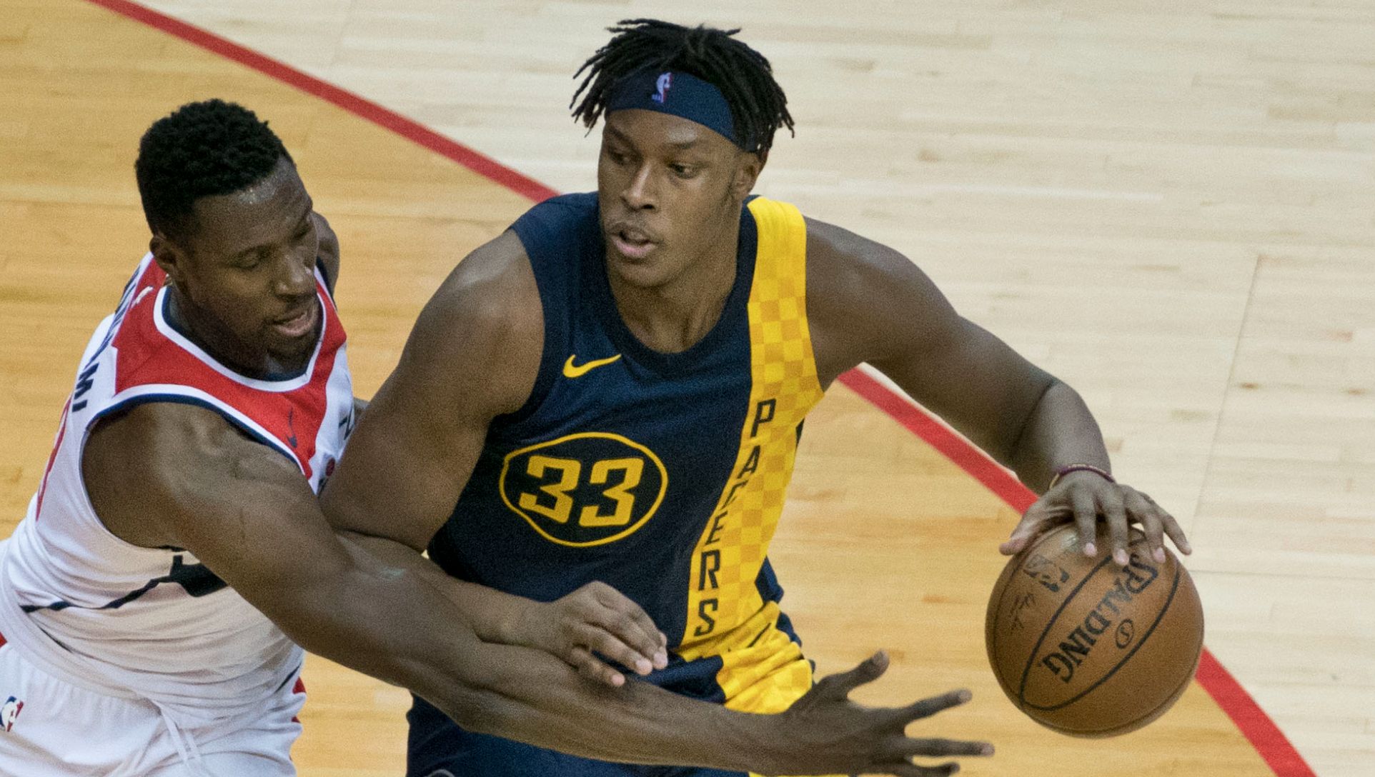 Myles Turner trying to score against the Wizards
