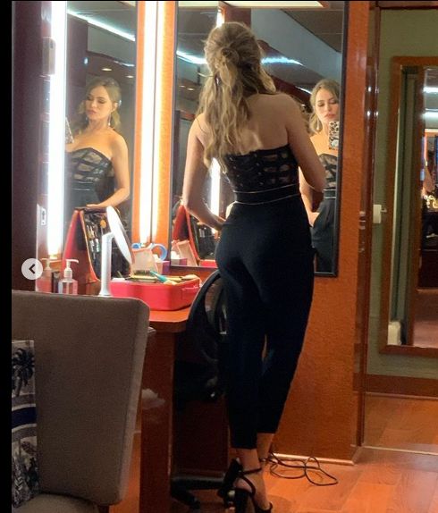 Sofia Vergara poses for a selfie backstage