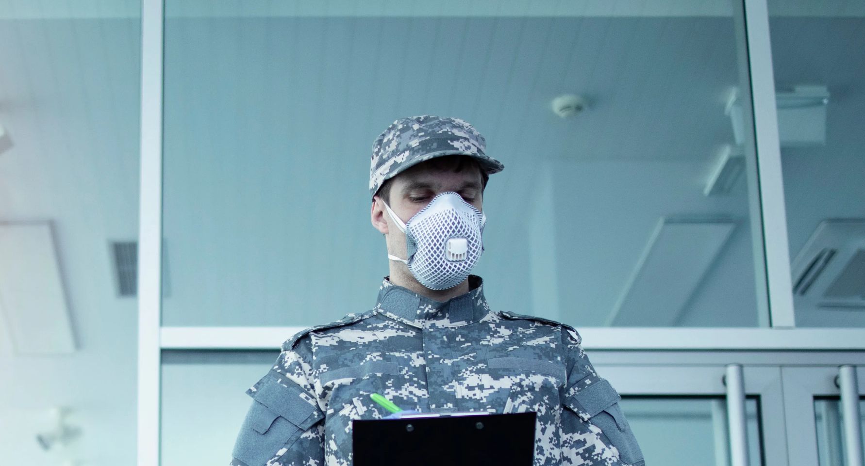 Soldier wearing a protective face mask.