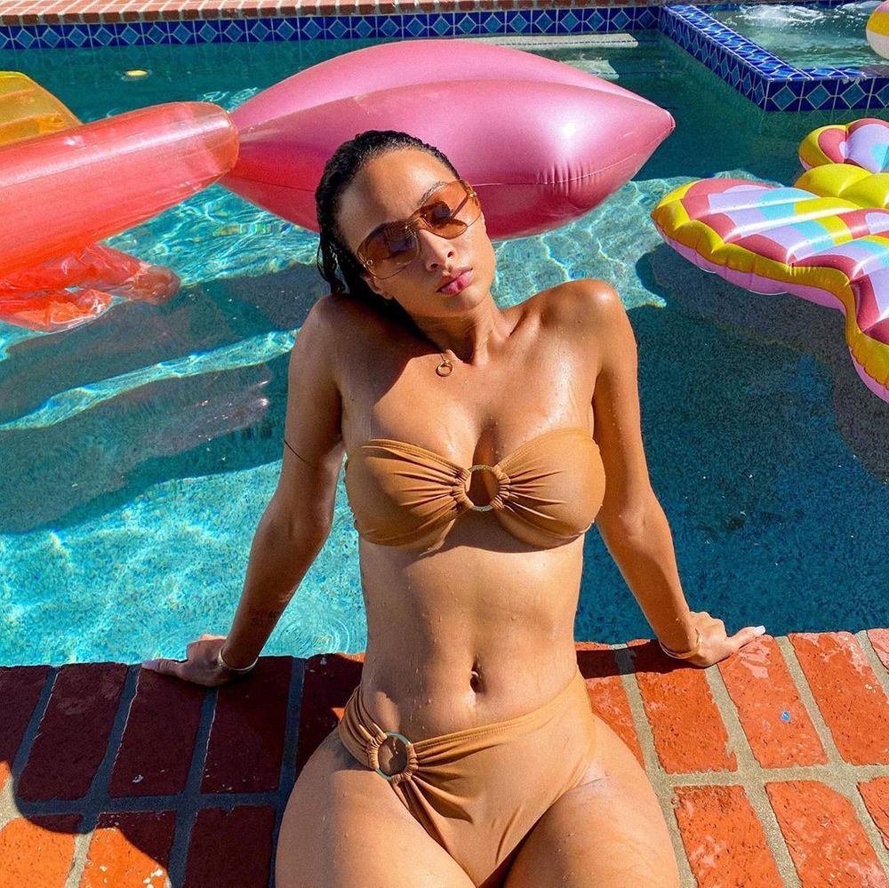 Draya Michele poolside in bikini