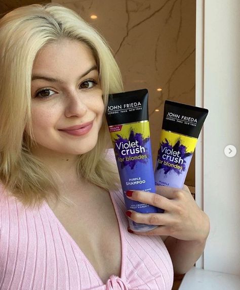 Ariel Winter poses with shampoo bottles and blonde hair