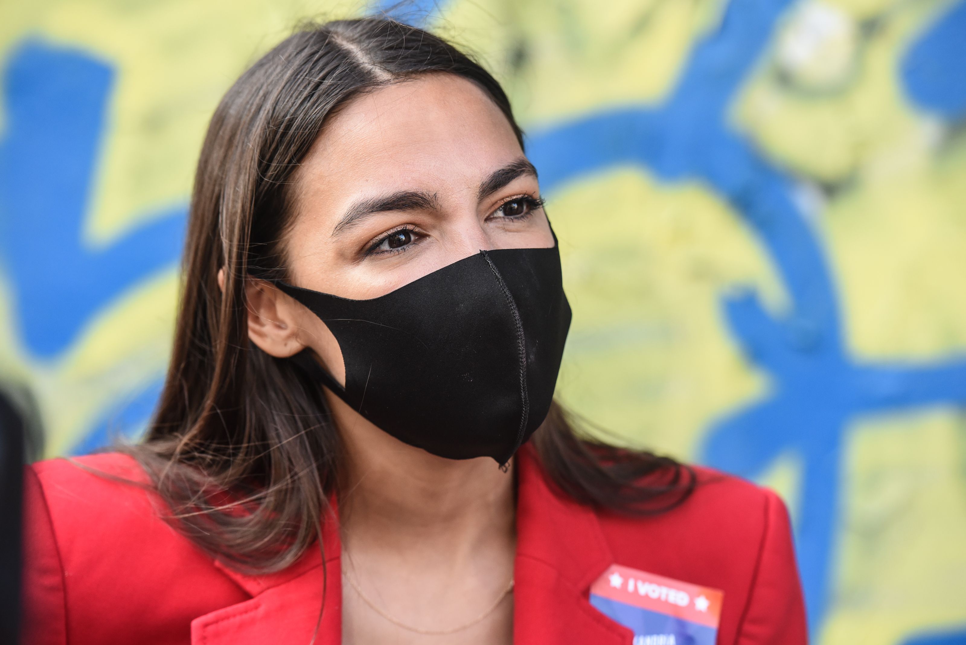 Alexandria Ocasio-Cortez appears at an event.