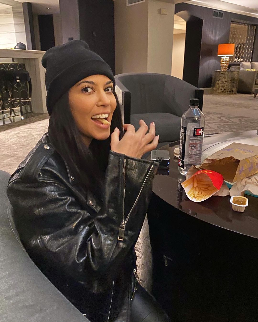 Kourtney Kardashian snacking on fries