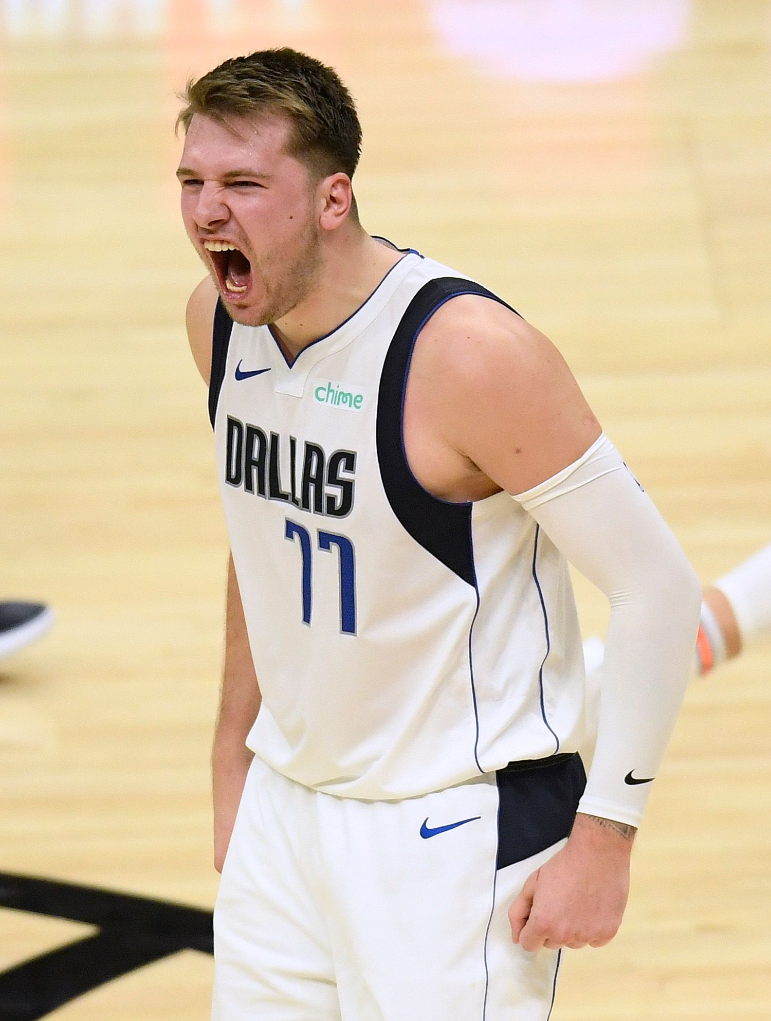 Luka Doncic screams after a successful play