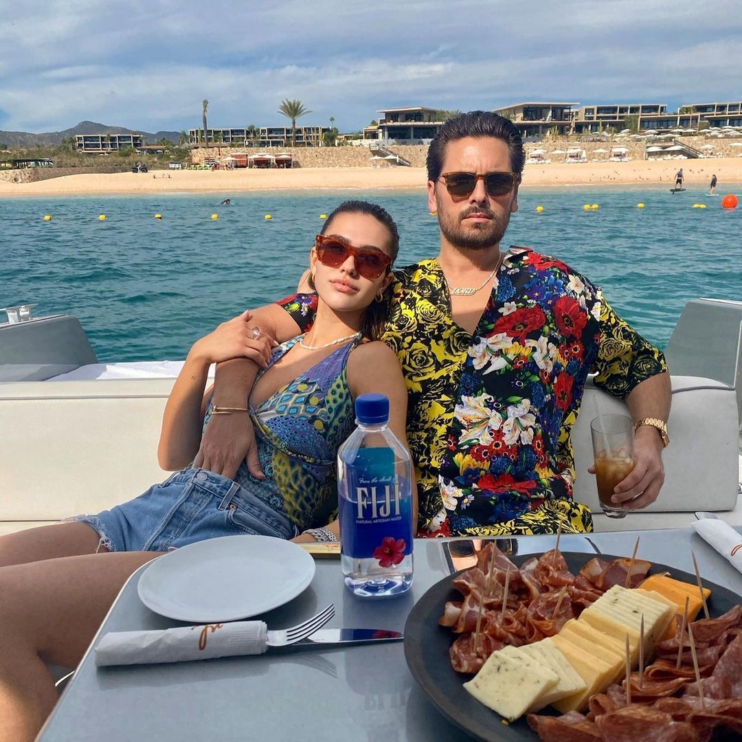 Amelia Hamlin and Scott Disick by the water