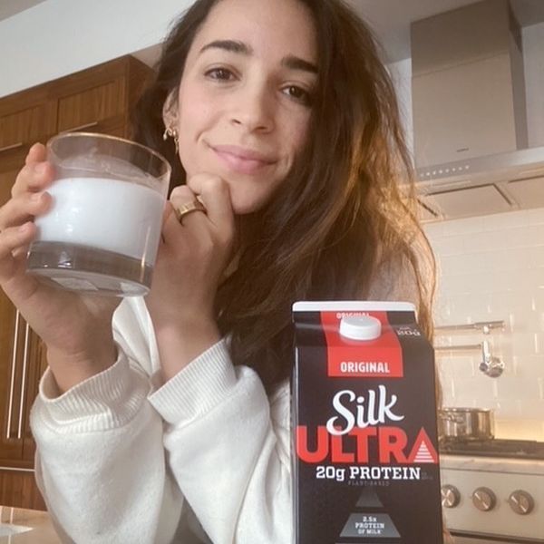 Aly Raisman in kitchen with milk